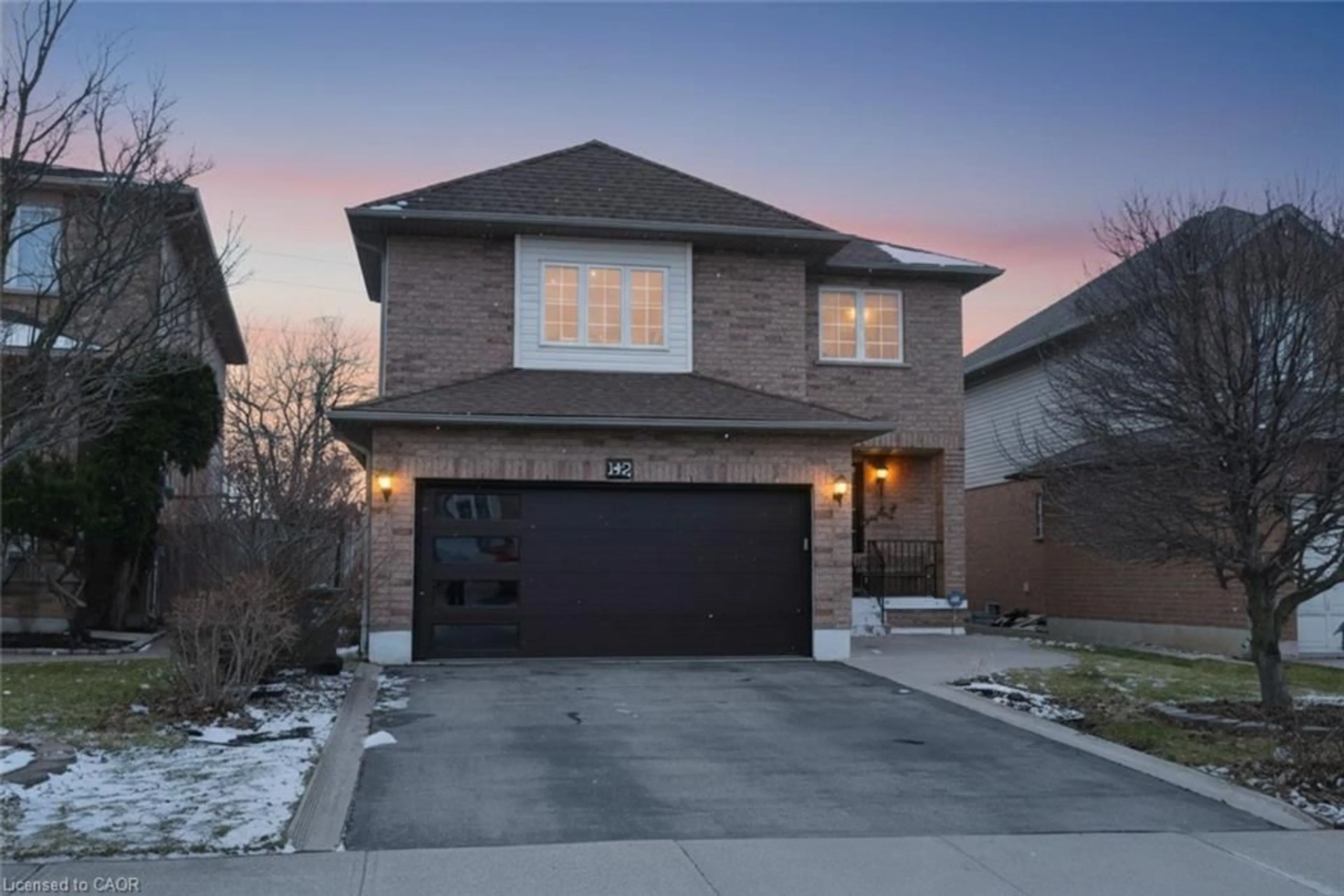 Home with brick exterior material, street for 142 Hawkswood Trail, Hamilton Ontario L9B 2R5