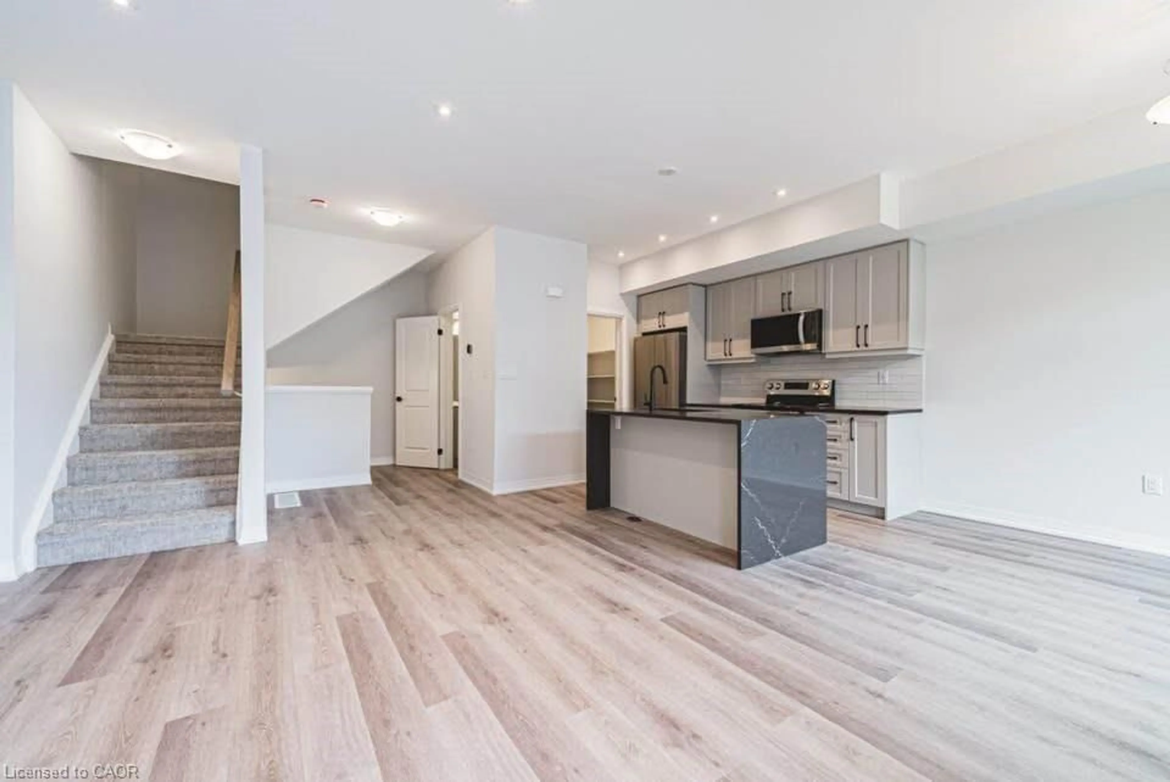 Open concept kitchen, unknown for 155 Equestrian Way #131, Cambridge Ontario N3E 0E8