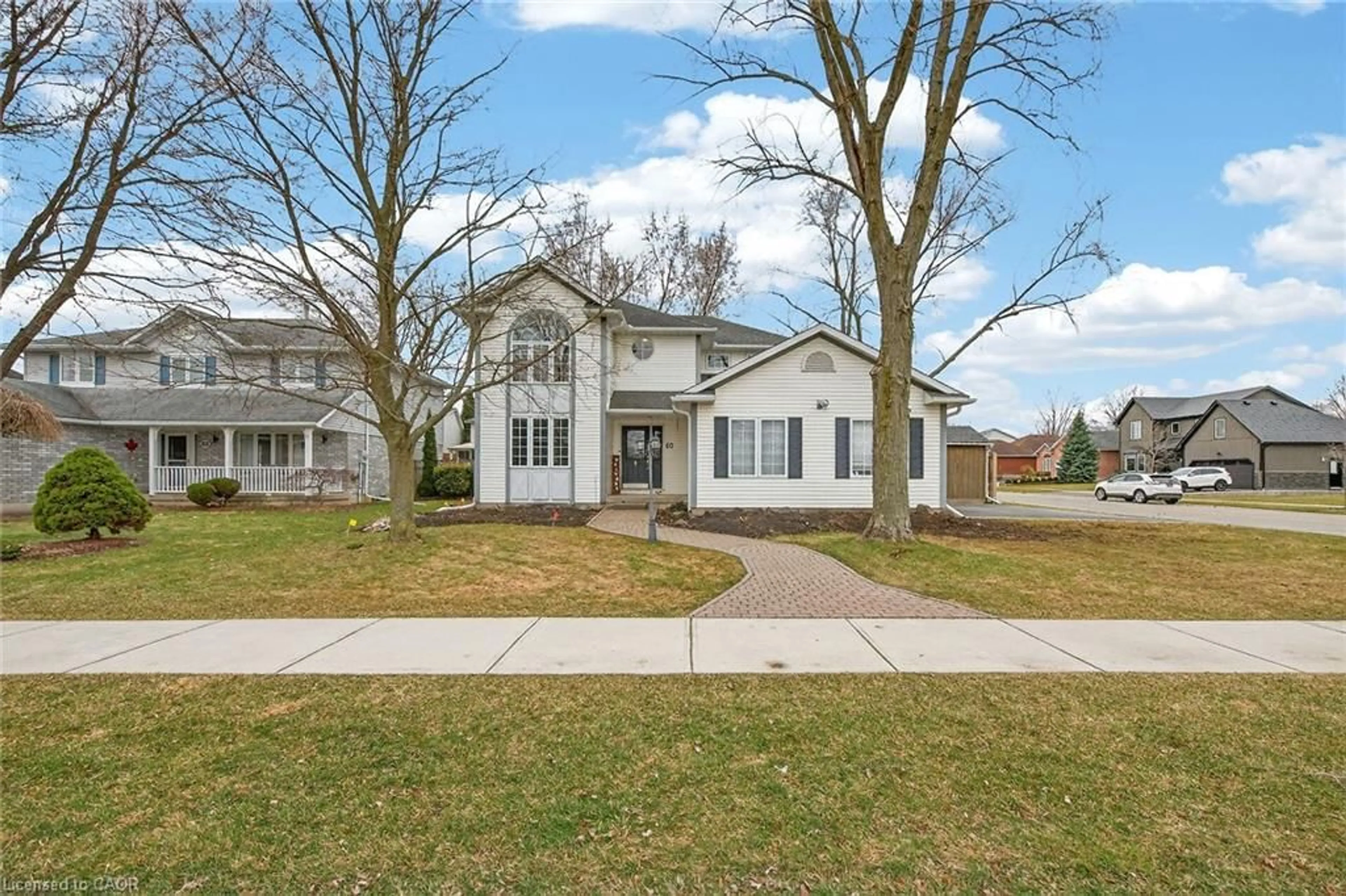 Home with brick exterior material, street for 60 Highland Blvd, Caledonia Ontario N3W 1H4