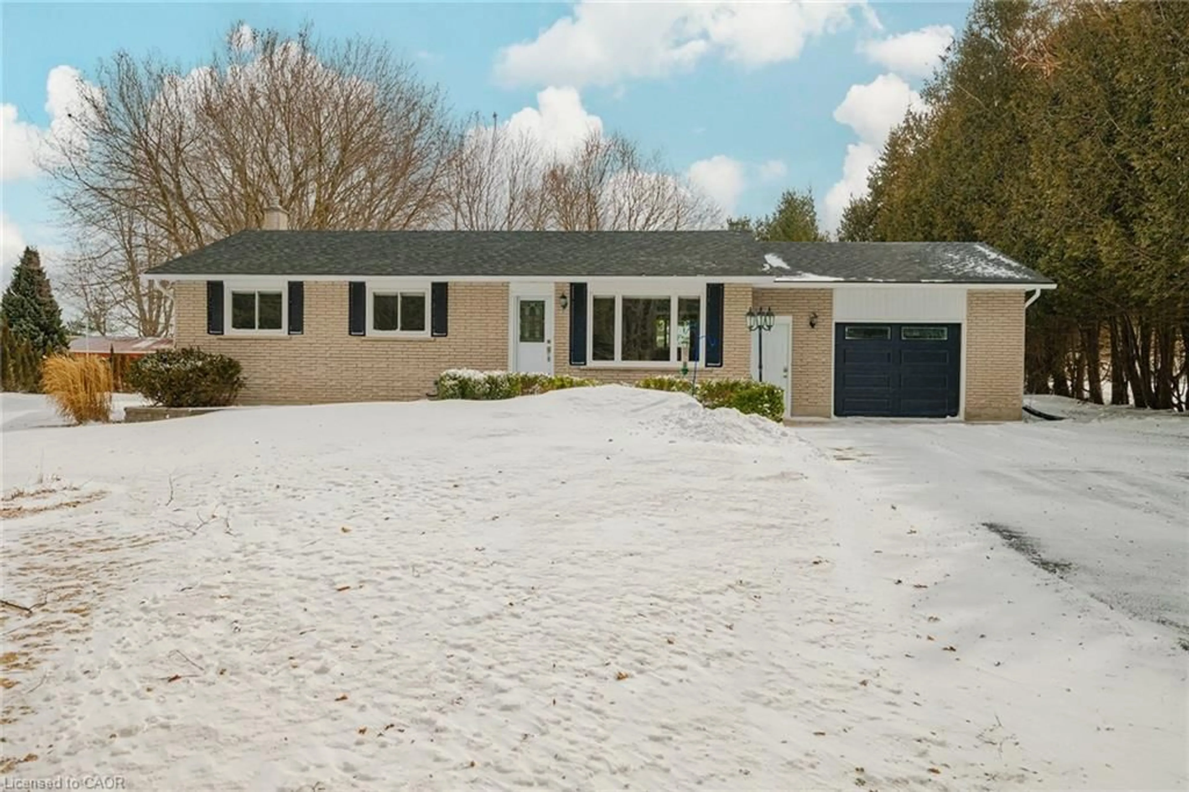 Home with vinyl exterior material, street for 7315 Sideroad 15, Moorefield Ontario N0G 2K0