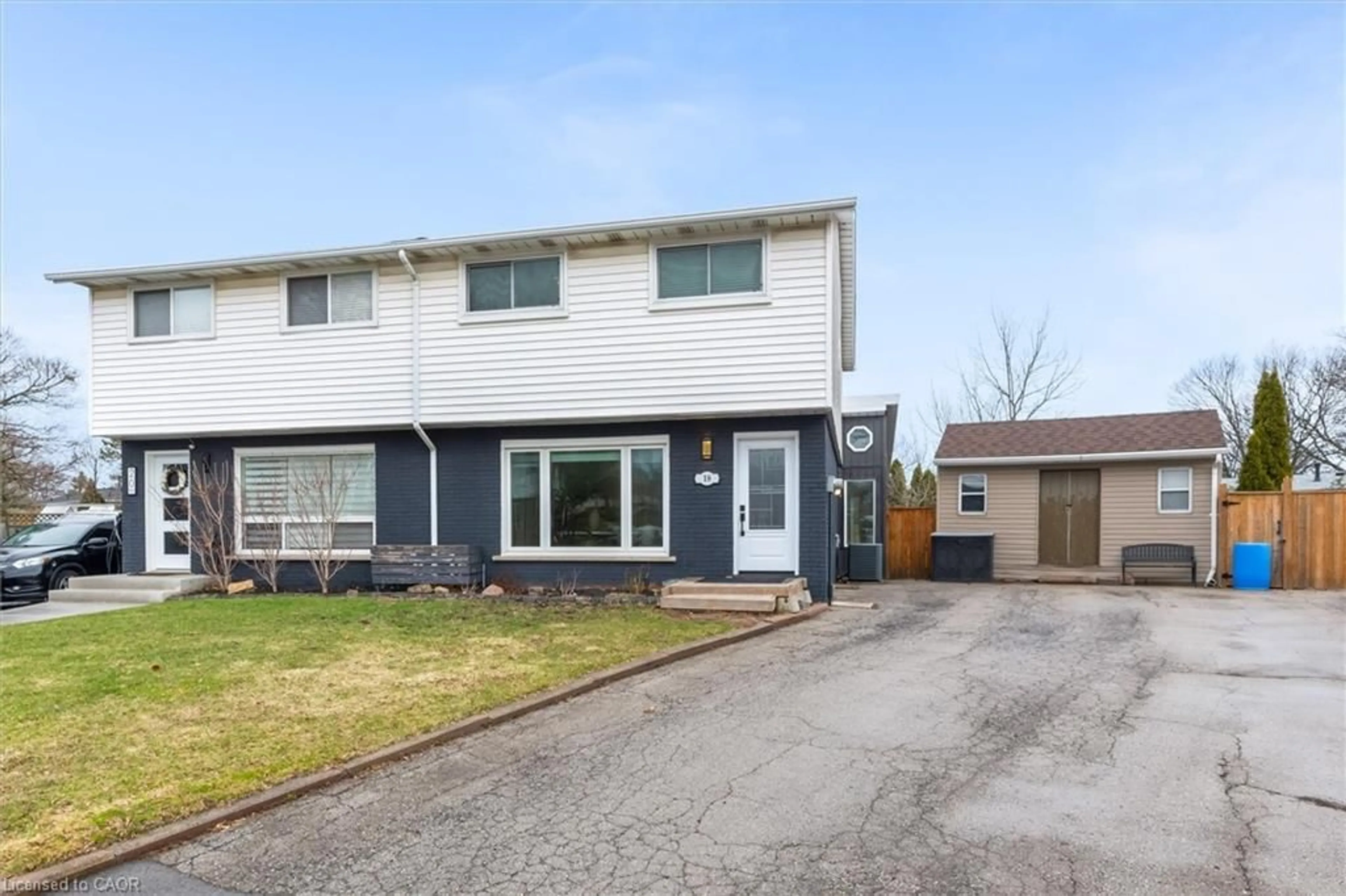 Home with vinyl exterior material, street for 18 Bentley Pl, Hamilton Ontario L9C 2R4