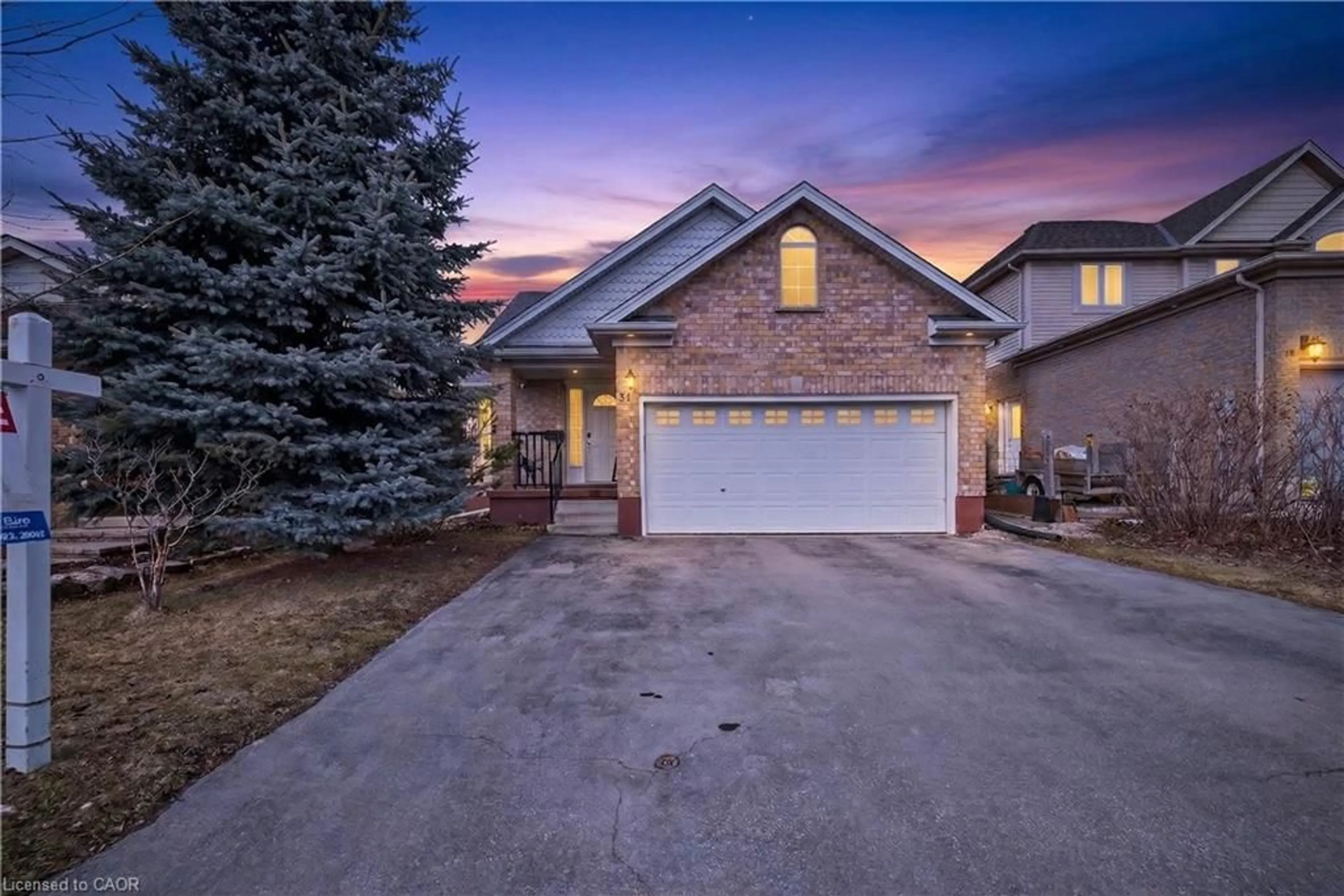 Home with brick exterior material, street for 91 Flaherty Dr, Guelph Ontario N1K 1Y7