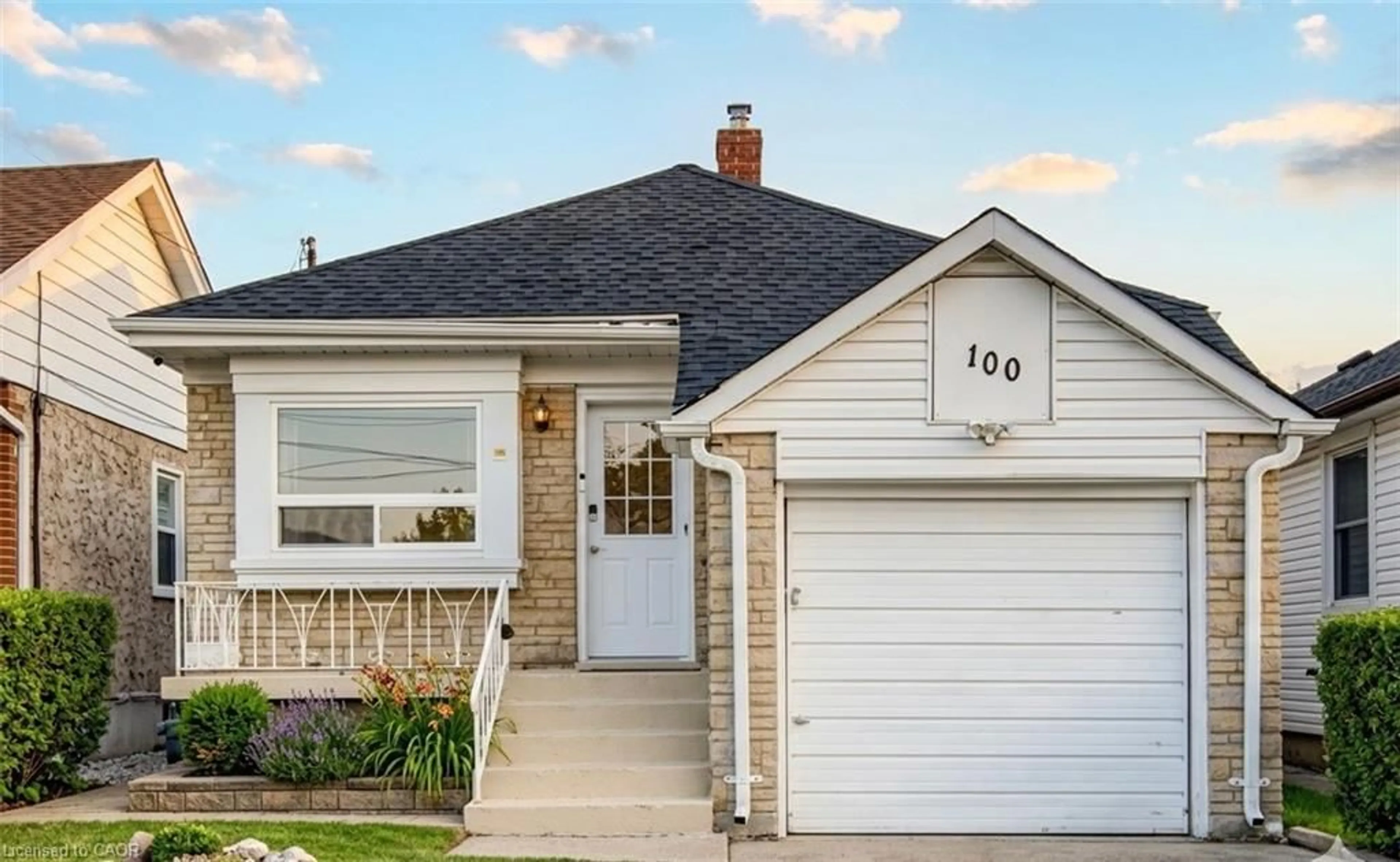 Home with vinyl exterior material, street for 100 Reid Ave, Hamilton Ontario L8K 3V1