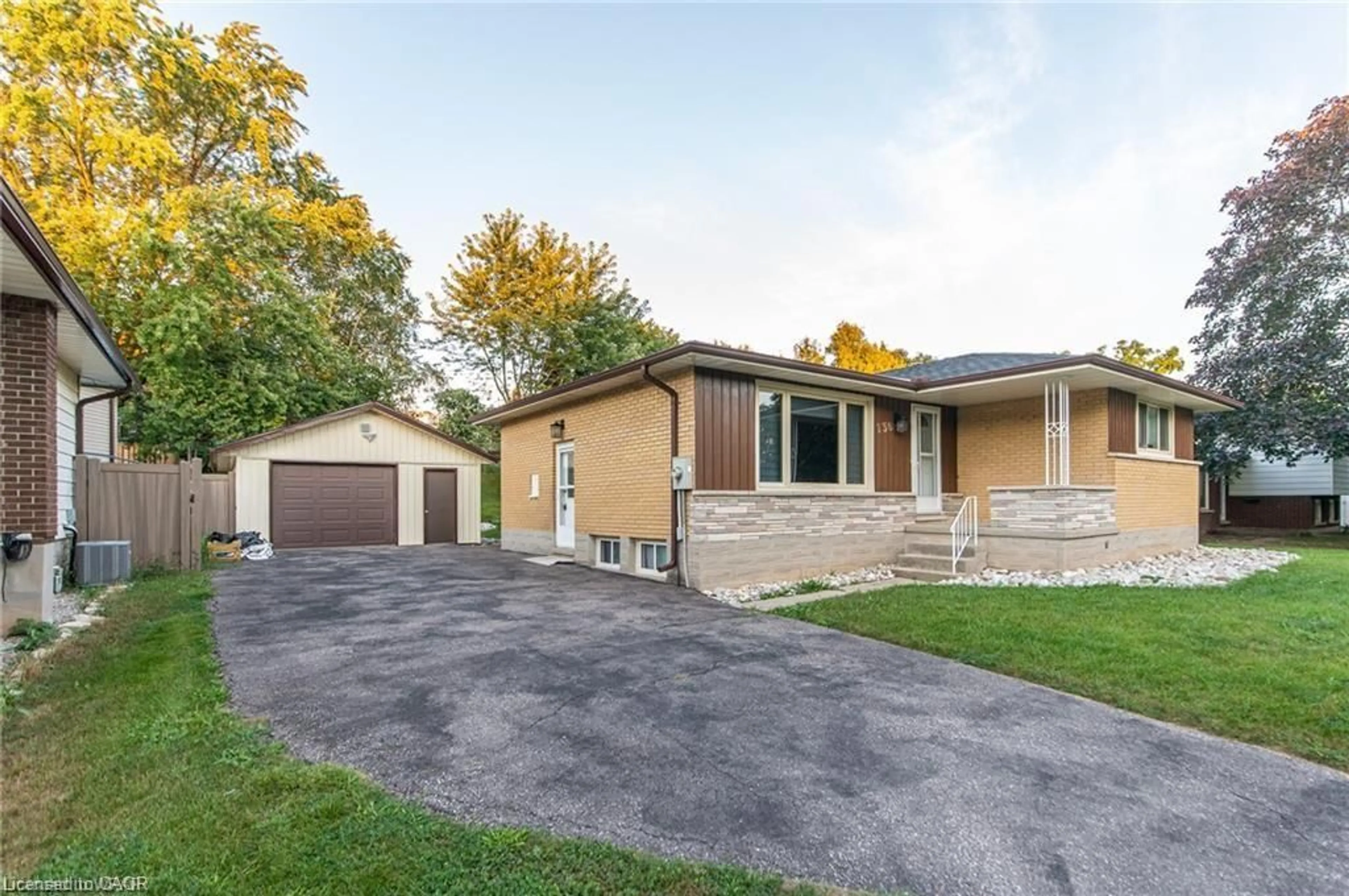 Home with brick exterior material, street for 136 Macgregor Cres, Waterloo Ontario N2J 3W9