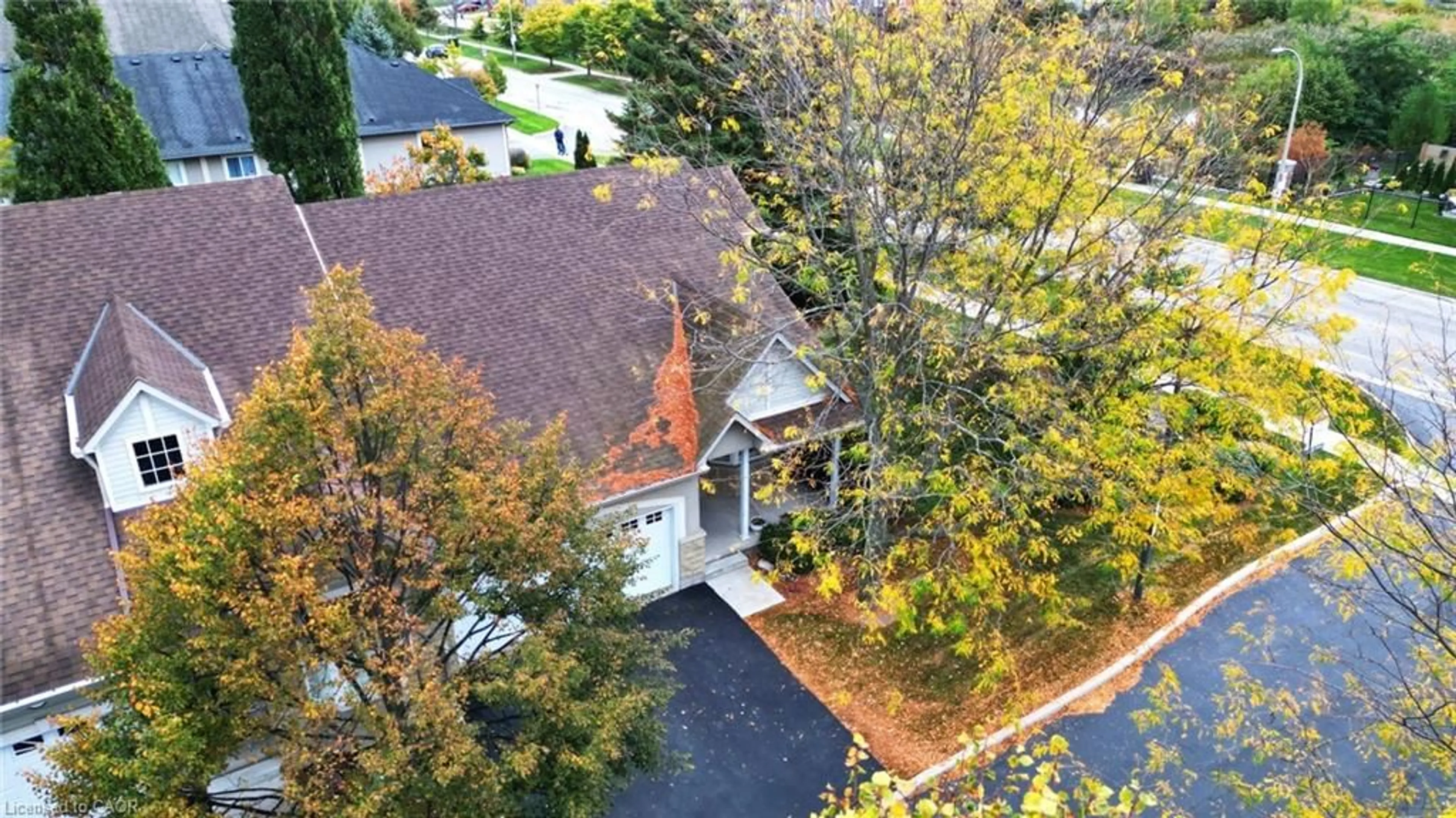 A pic from outside/outdoor area/front of a property/back of a property/a pic from drone, street for 212 Stonehenge Dr #1, Hamilton Ontario L9K 1N5