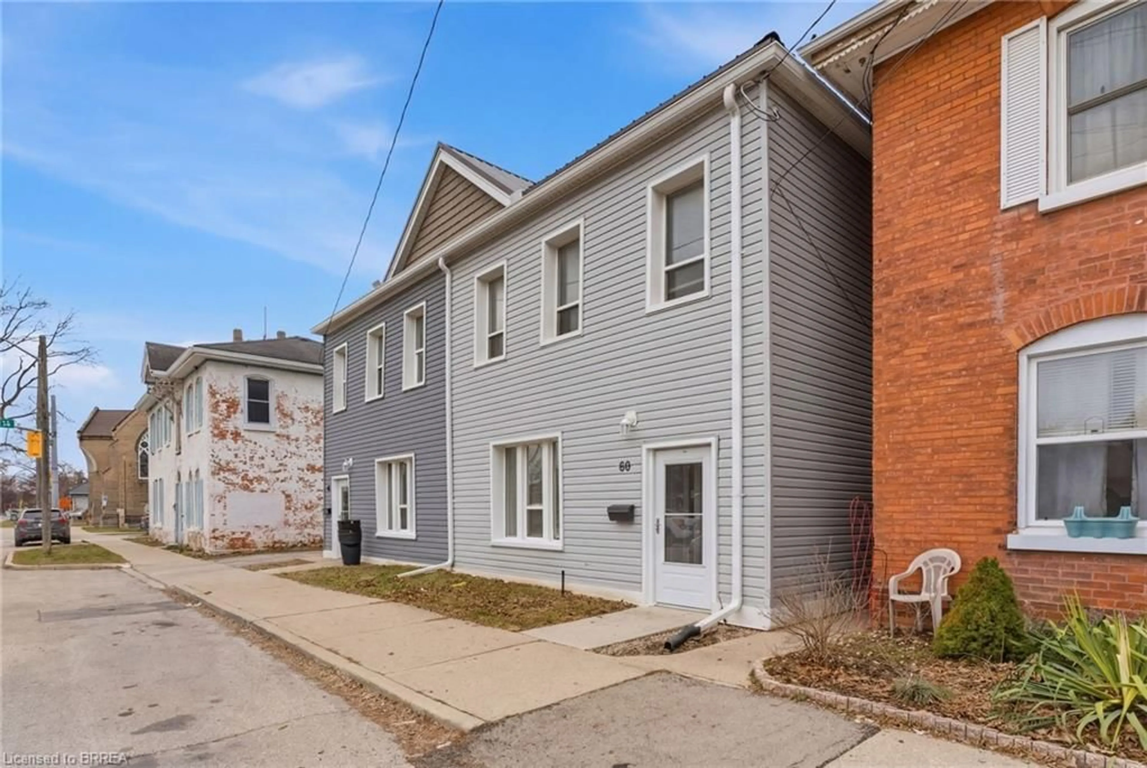 Home with brick exterior material, street for 60 West St, Brantford Ontario N3T 3E7