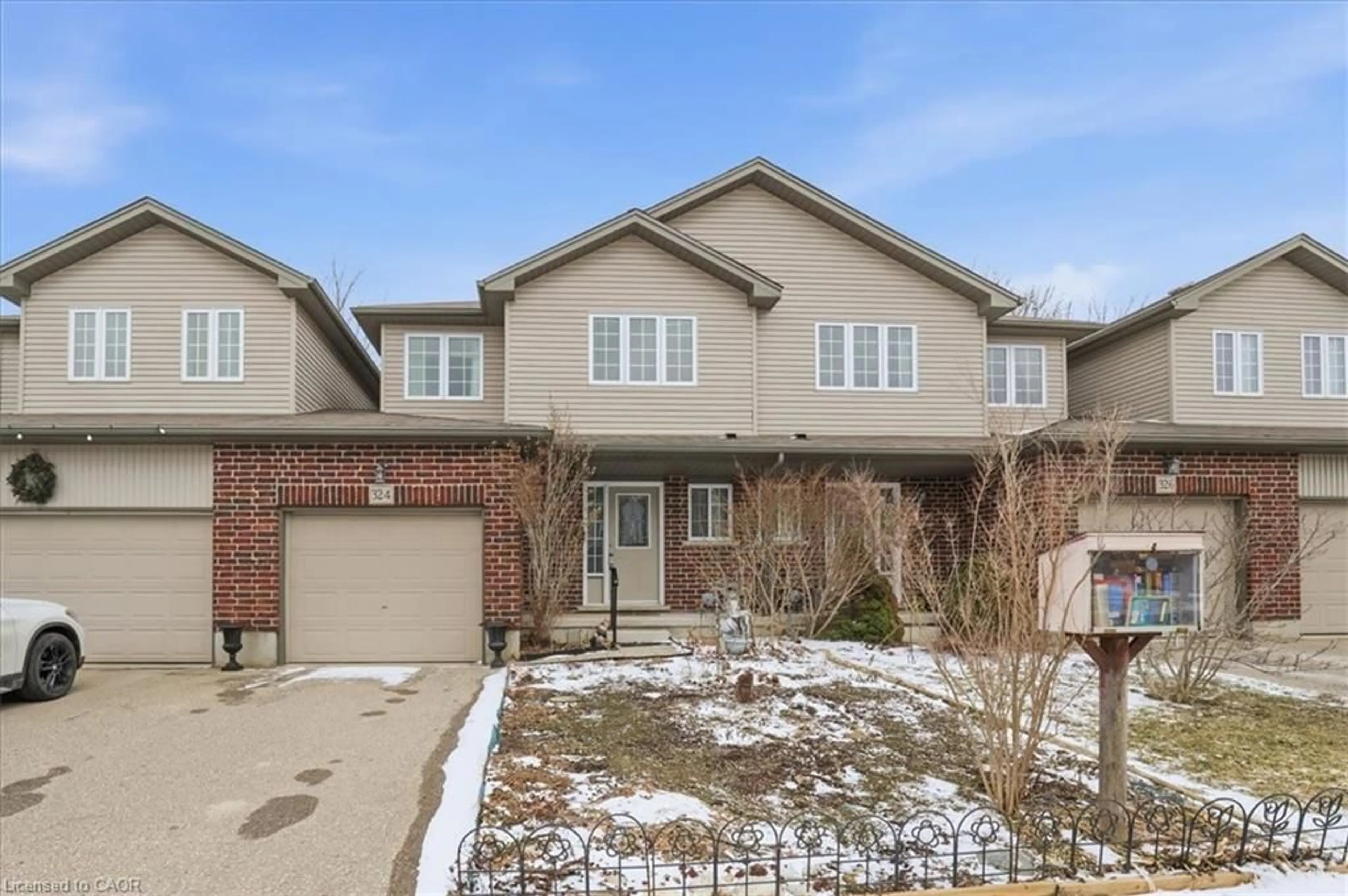 Home with brick exterior material, street for 324 Maverick St, Waterloo Ontario N2K 0A4