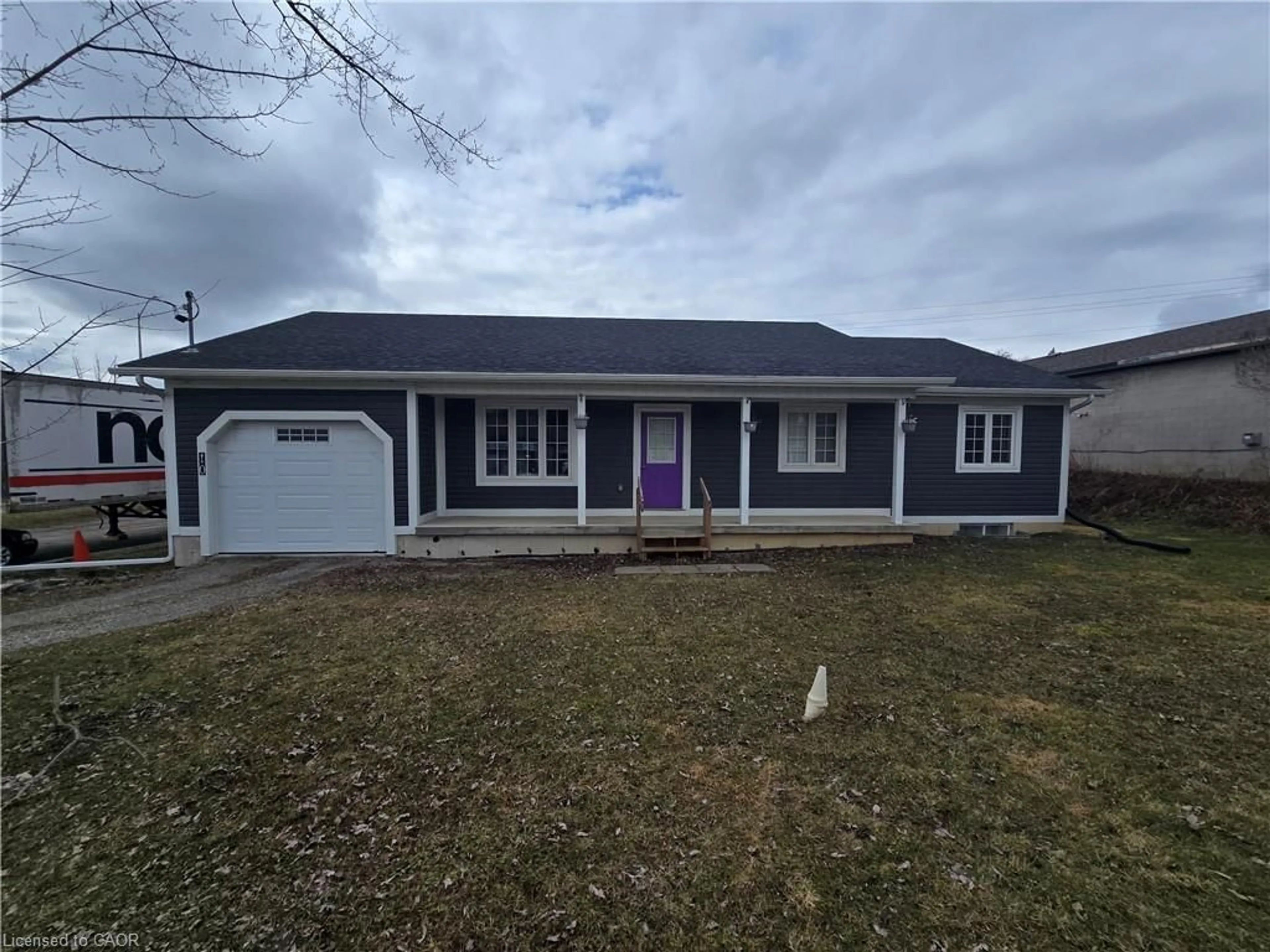 Home with vinyl exterior material, street for 10 Woolwich St, Breslau Ontario N0B 1M0