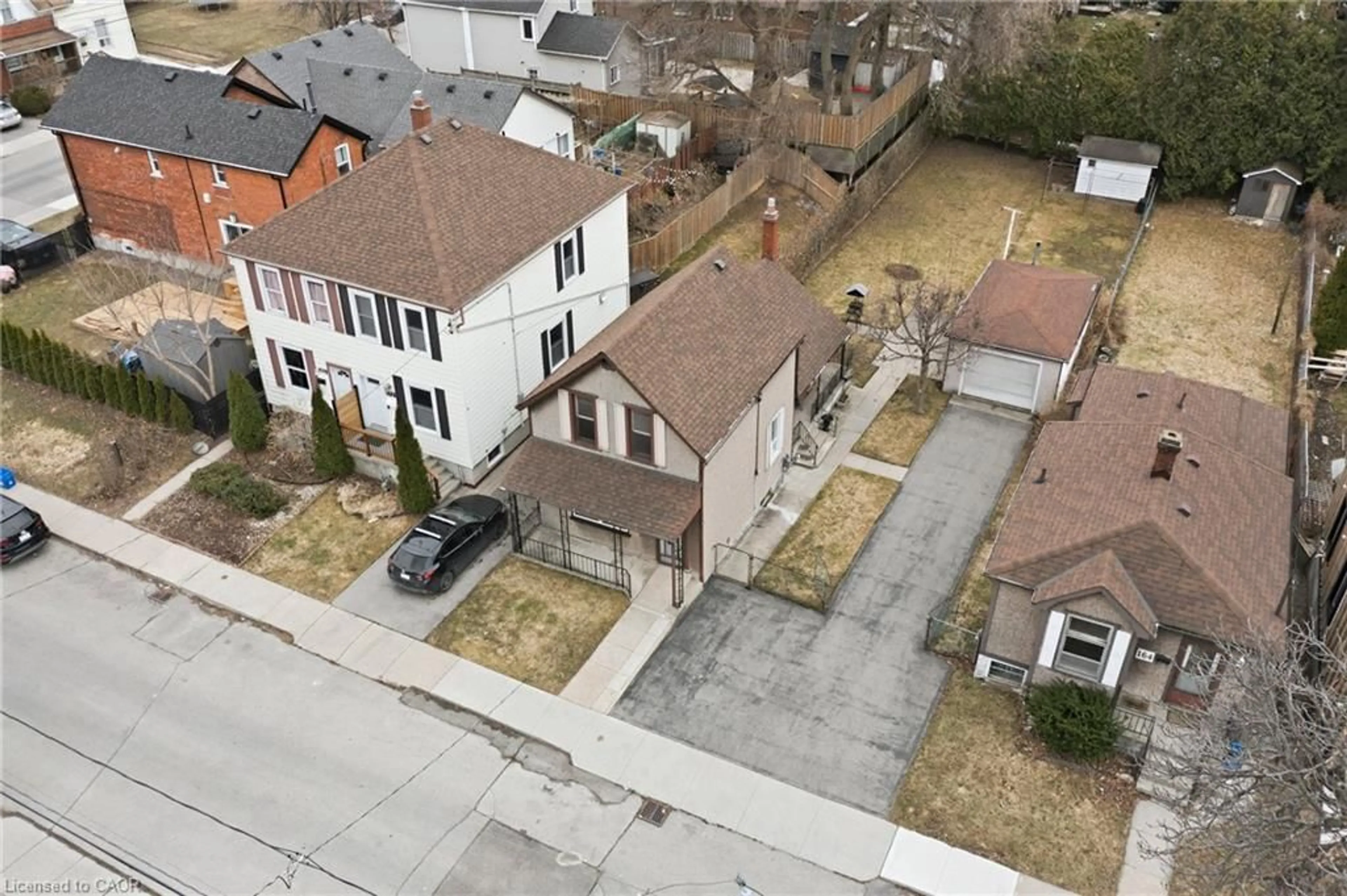 A pic from outside/outdoor area/front of a property/back of a property/a pic from drone, street for 164 Macaulay St, Hamilton Ontario L8L 3X6