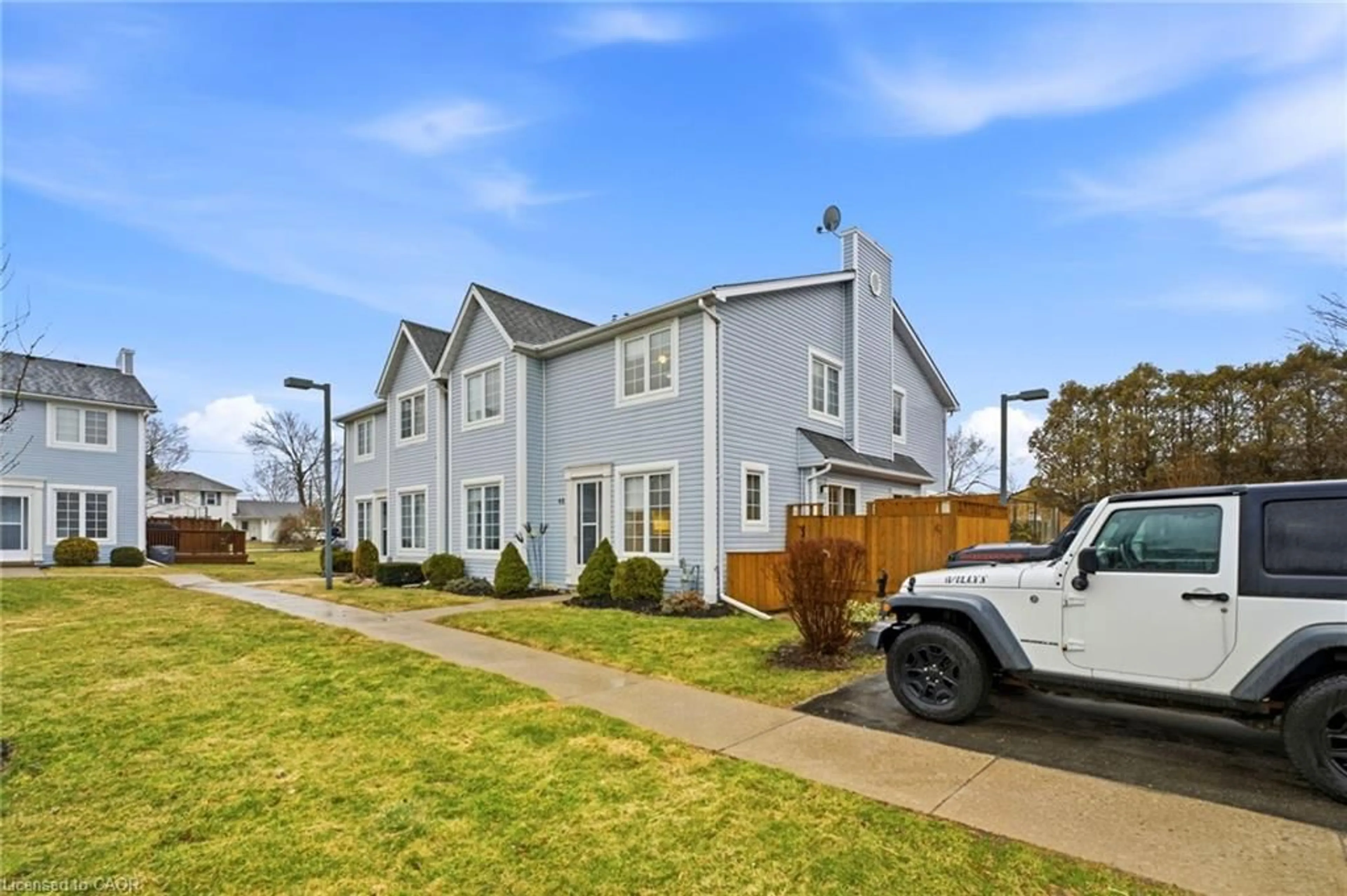 Home with vinyl exterior material, street for 14 New Lakeshore Rd #48, Port Dover Ontario N0A 1N8