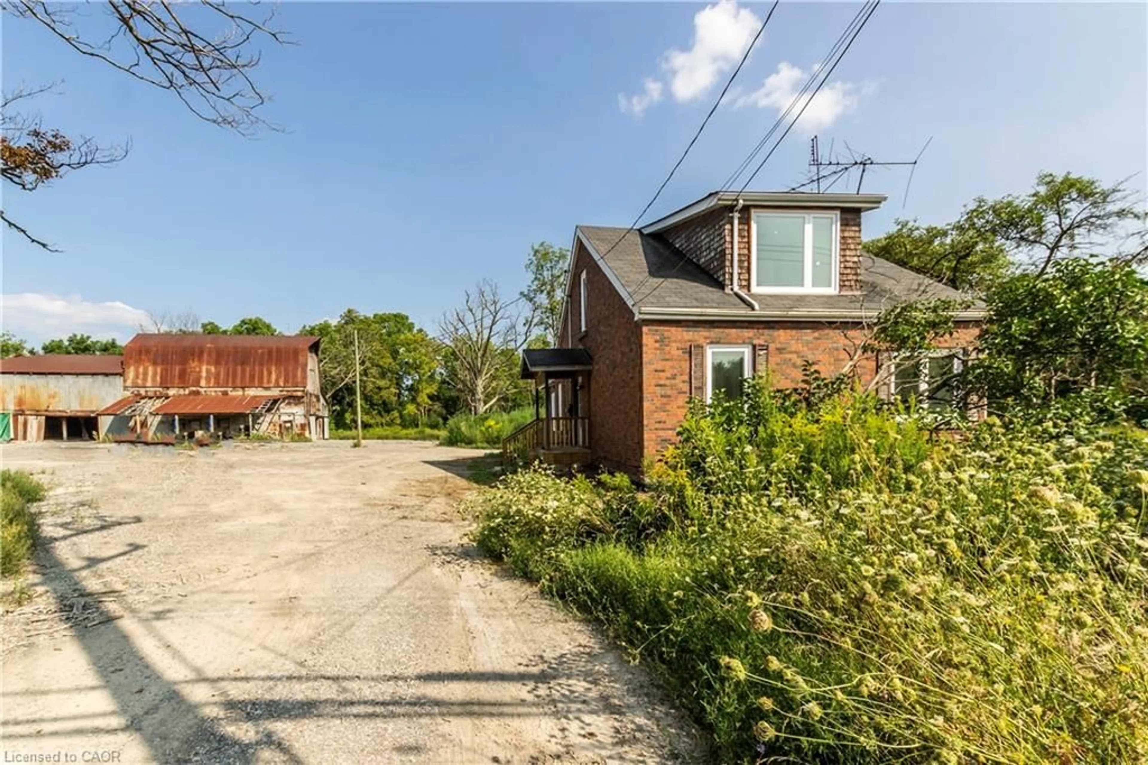 A pic from outside/outdoor area/front of a property/back of a property/a pic from drone, street for 1411 56 Hwy, Glanbrook Ontario L0R 1P0