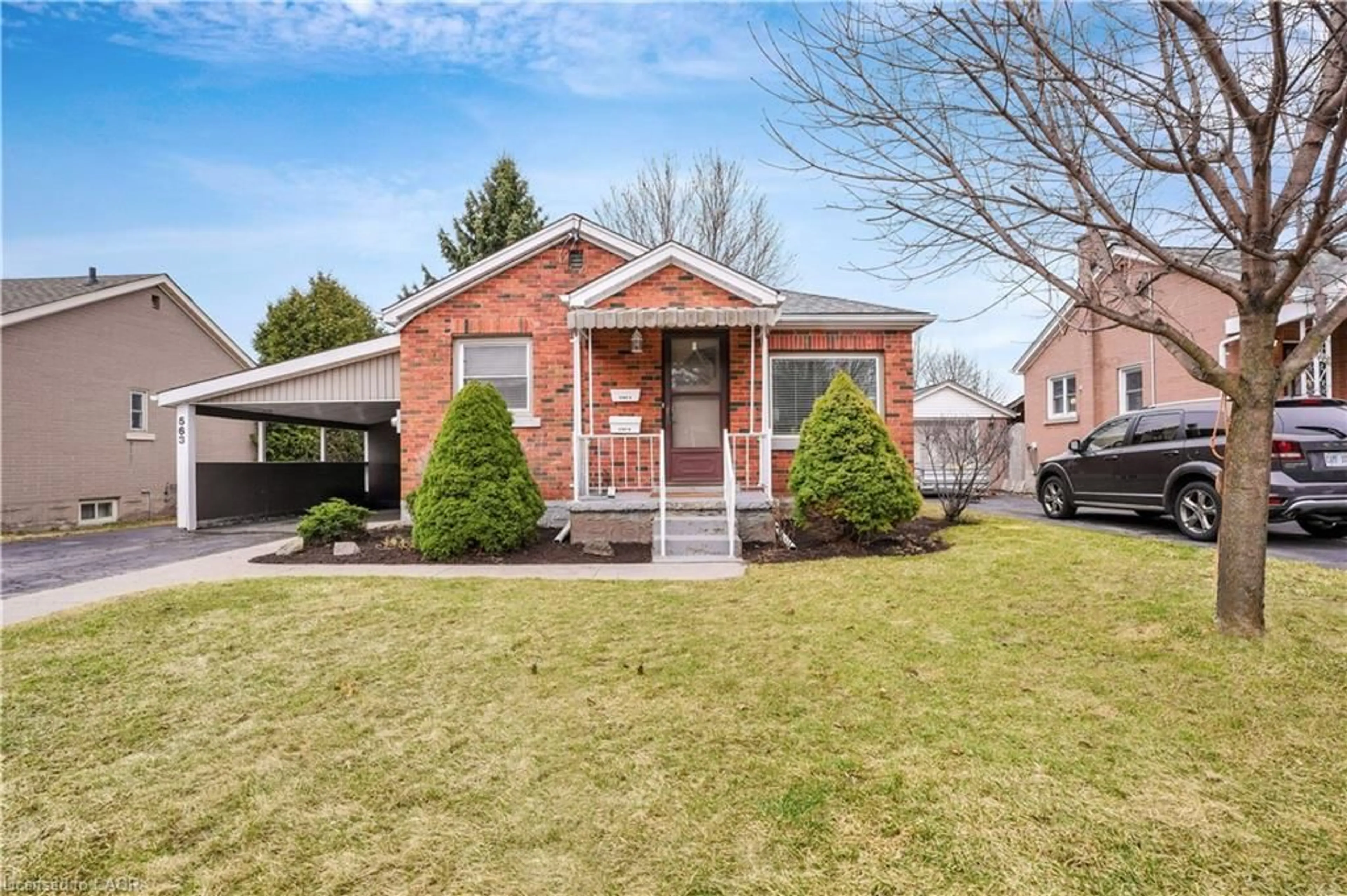 Home with brick exterior material, street for 563 Guelph St, Kitchener Ontario N2H 5Y2