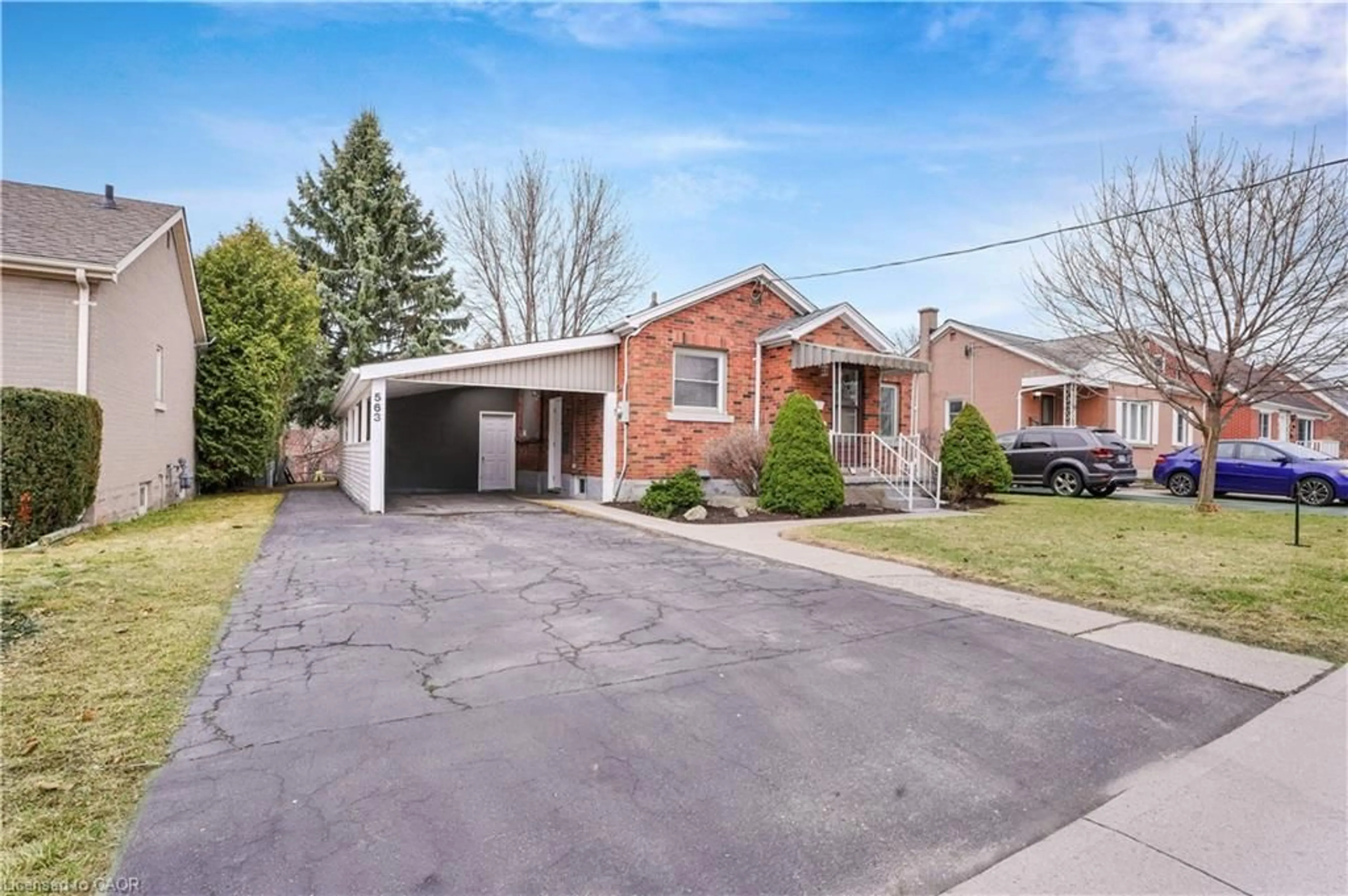 Home with brick exterior material, street for 563 Guelph St, Kitchener Ontario N2H 5Y2