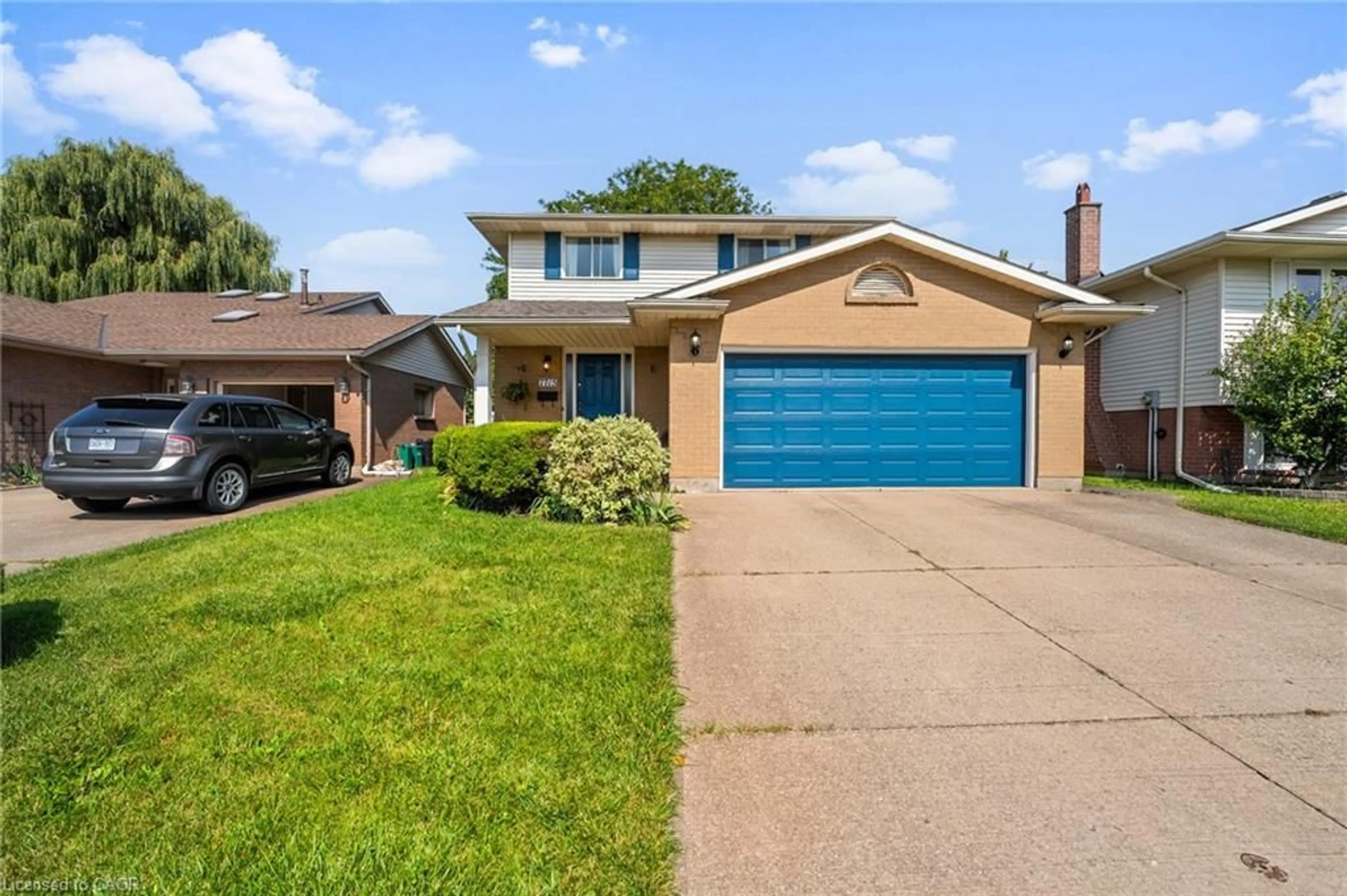 Home with brick exterior material, street for 7715 Swan St, Niagara Falls Ontario L2H 2P7