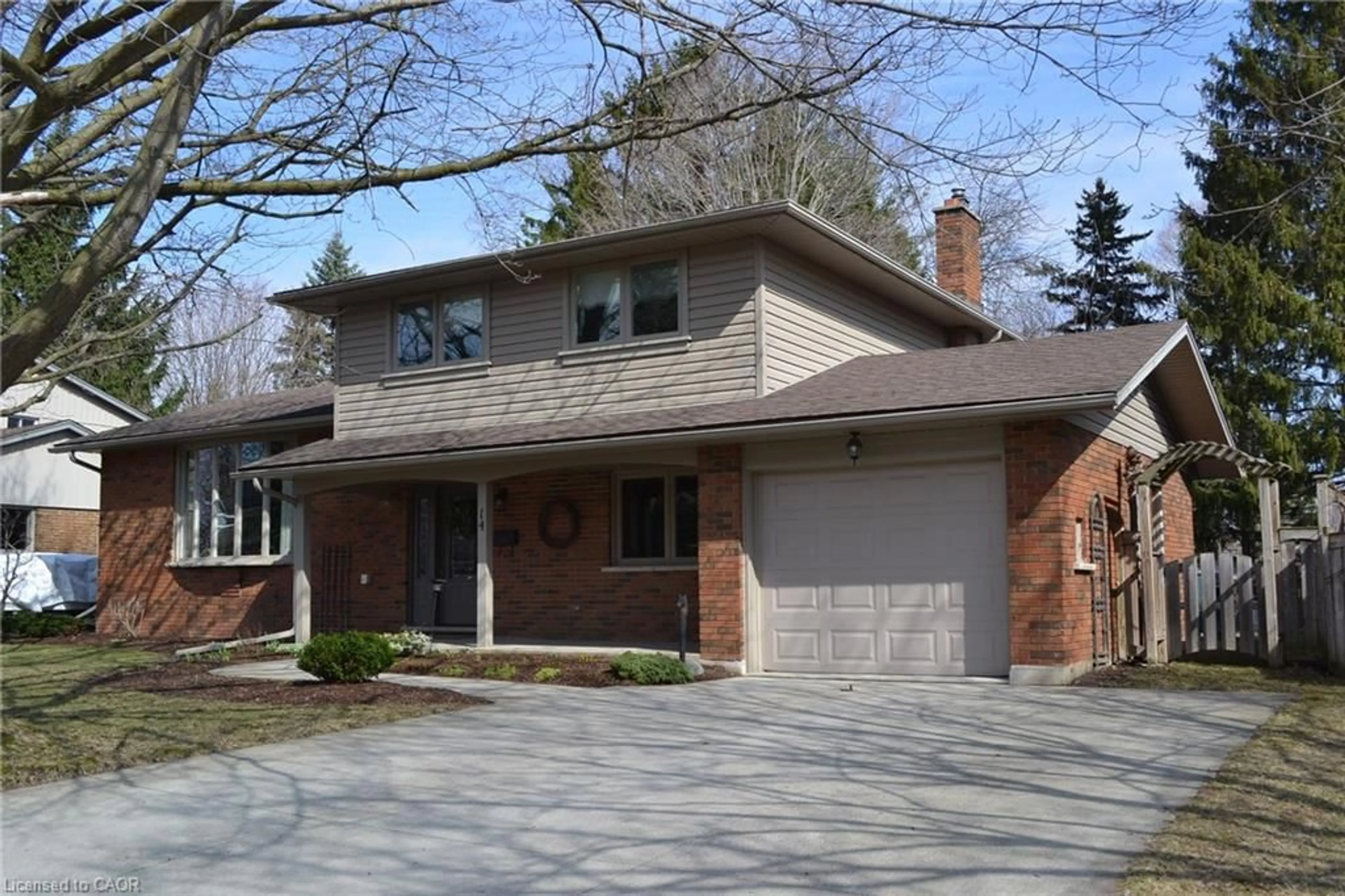 Home with brick exterior material, street for 14 Nightingale Cres, Elmira Ontario N3B 1A8