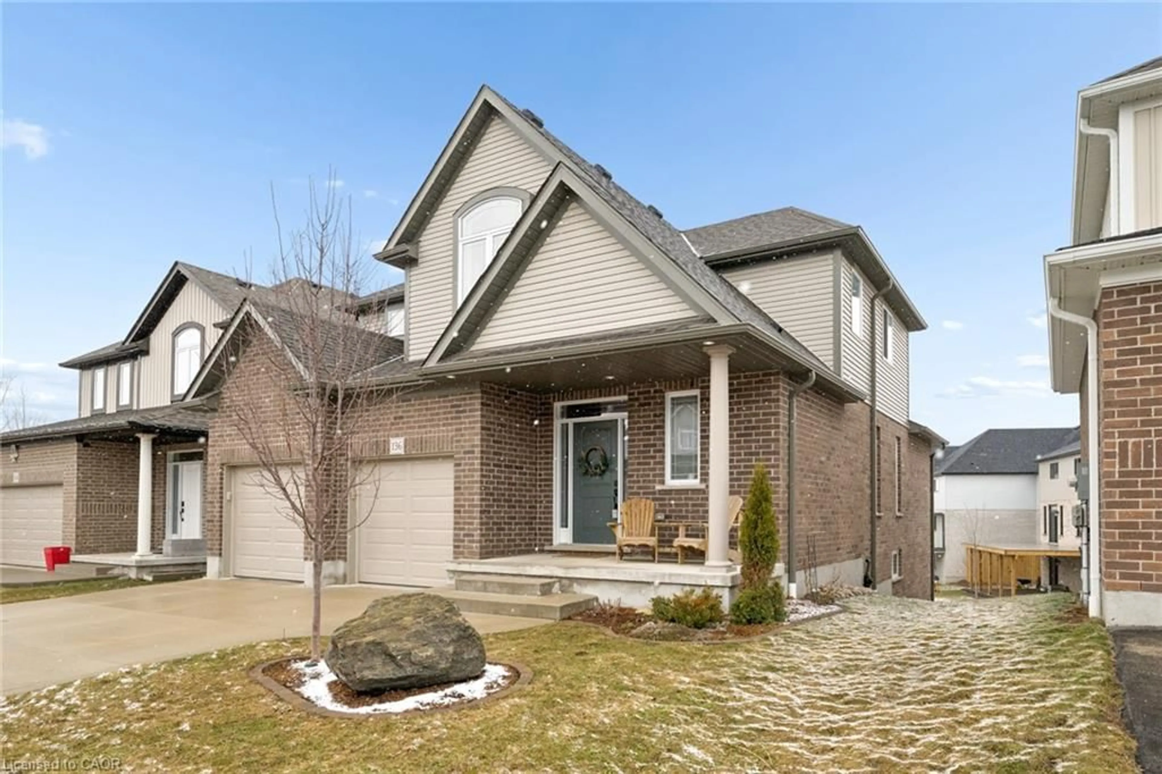 Home with brick exterior material, street for 136 Cinnamon Fern St, Waterloo Ontario N2V 0E9