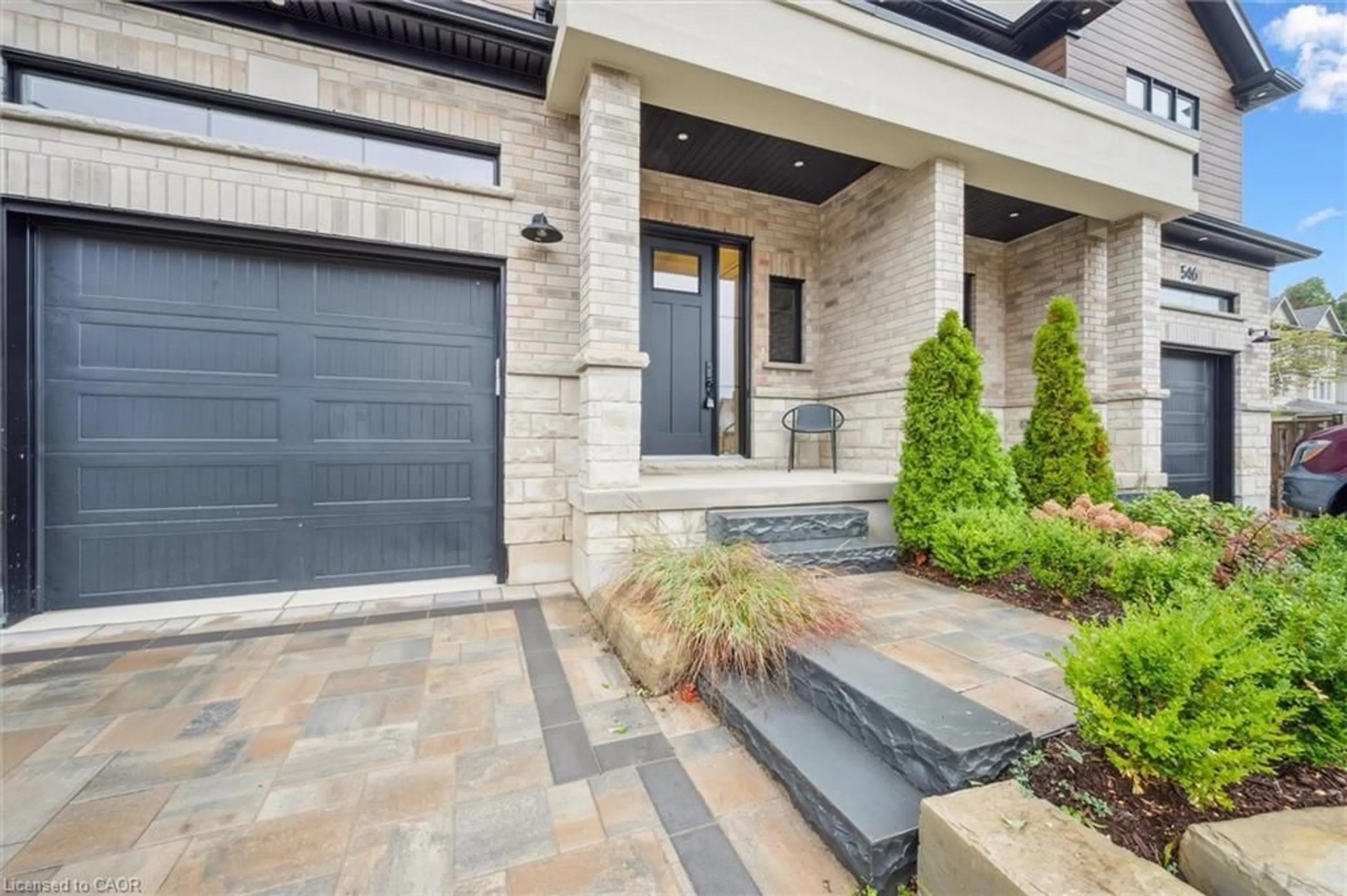 Home with brick exterior material, street for 548 Peach Blossom Crt, Kitchener Ontario N2E 3Z9