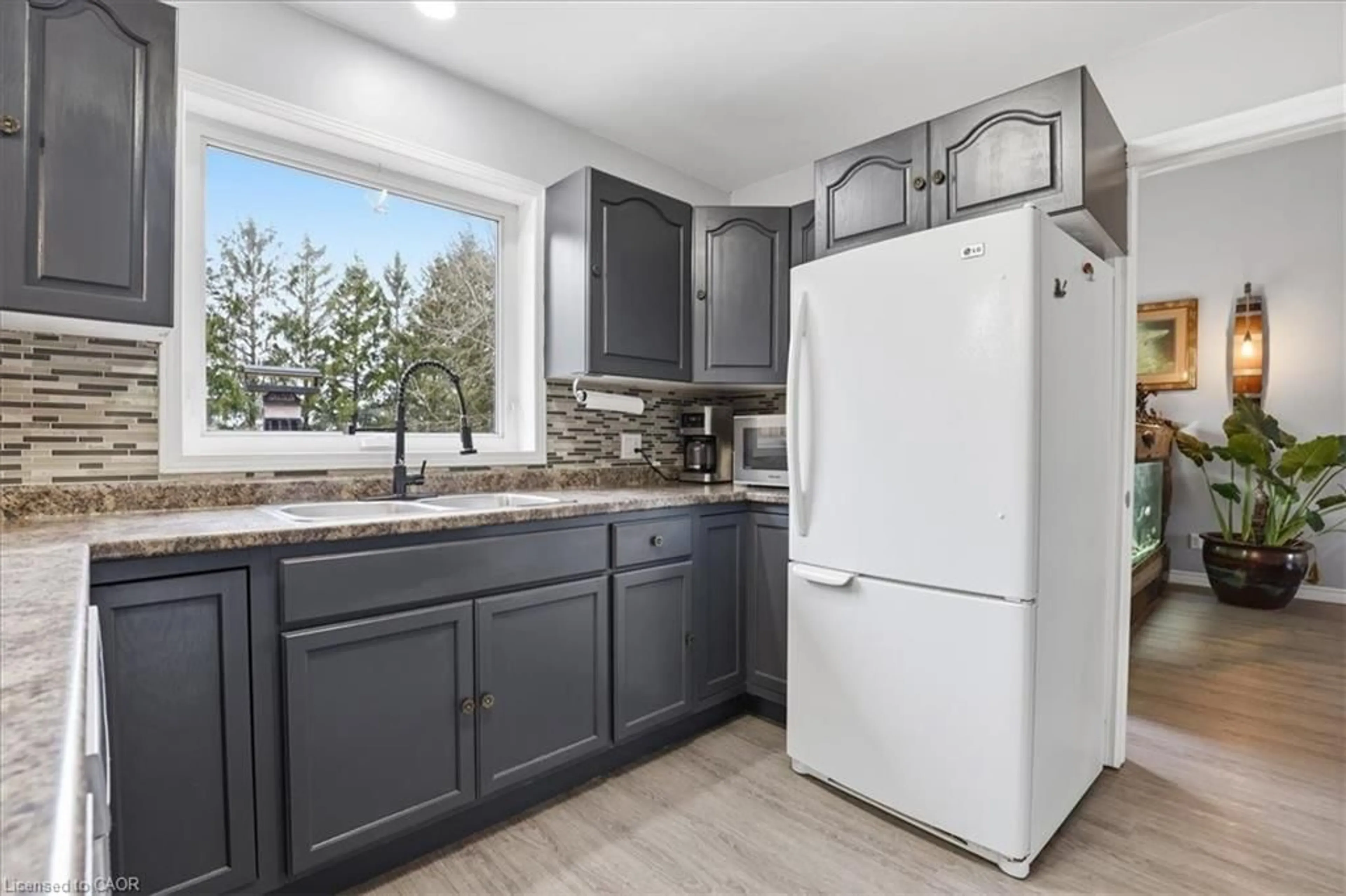 Open concept kitchen, ceramic/tile floor for 6 Bannister St, Oakland Ontario N0E 1L0