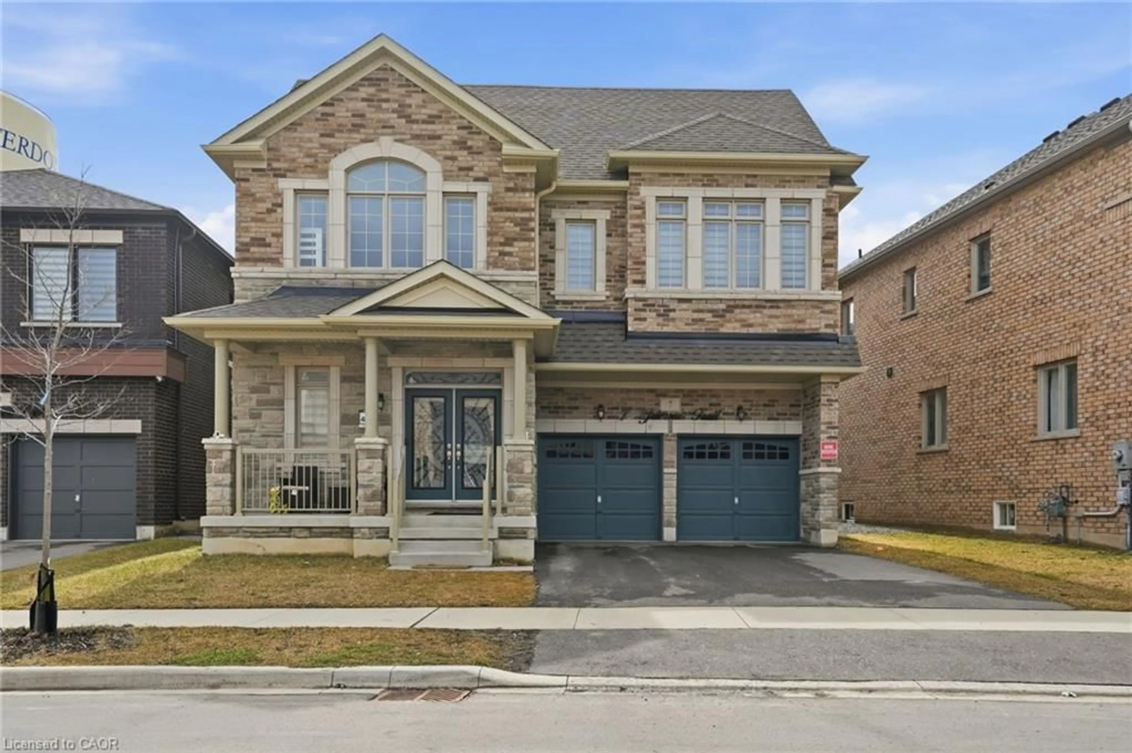 Home with brick exterior material, street for 7 Grierson Trail, Waterdown Ontario L8B 1Z7