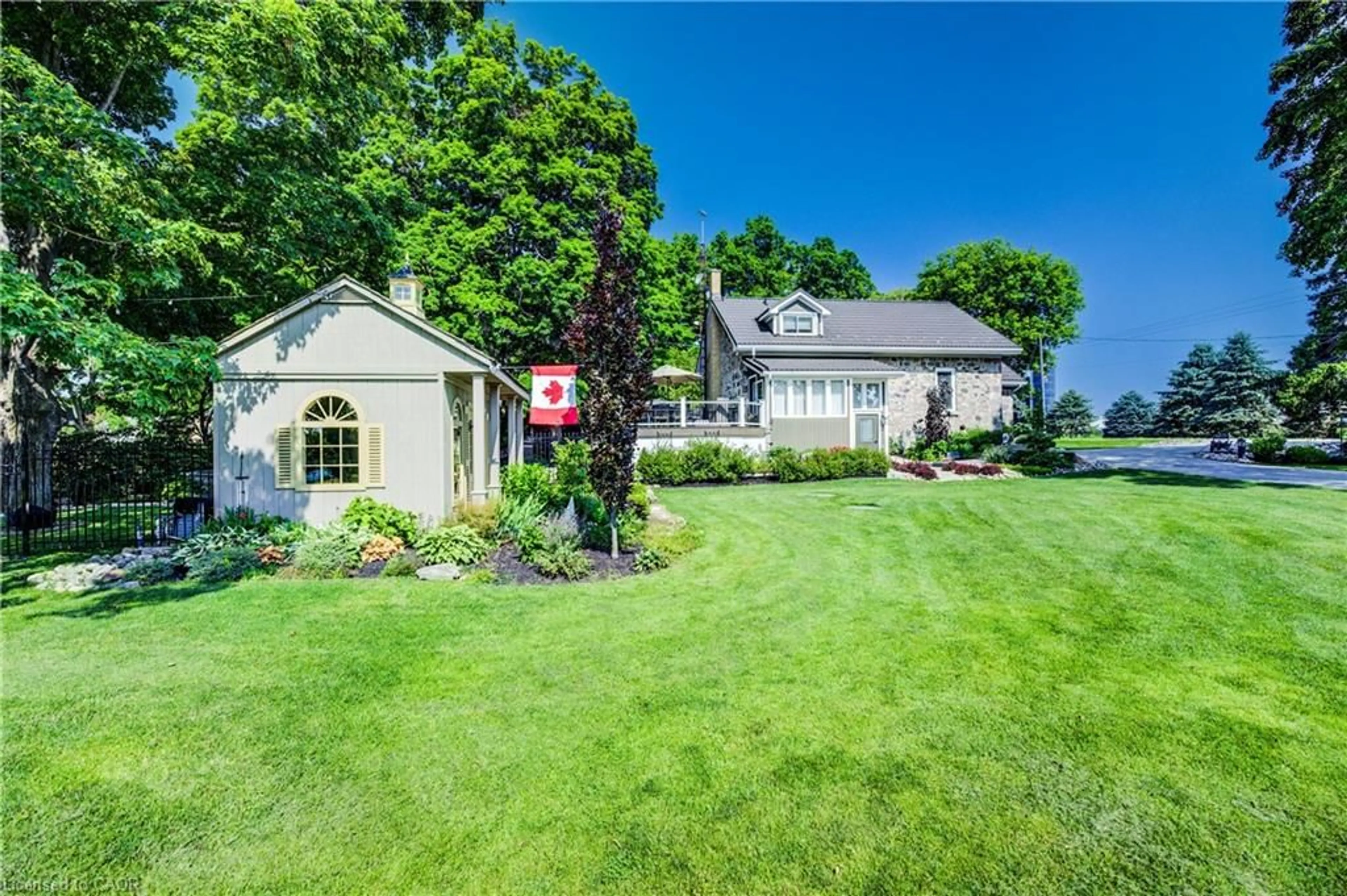 A pic from outside/outdoor area/front of a property/back of a property/a pic from drone, street for 6265 Line 89, Gowanstown Ontario N0G 1Y0