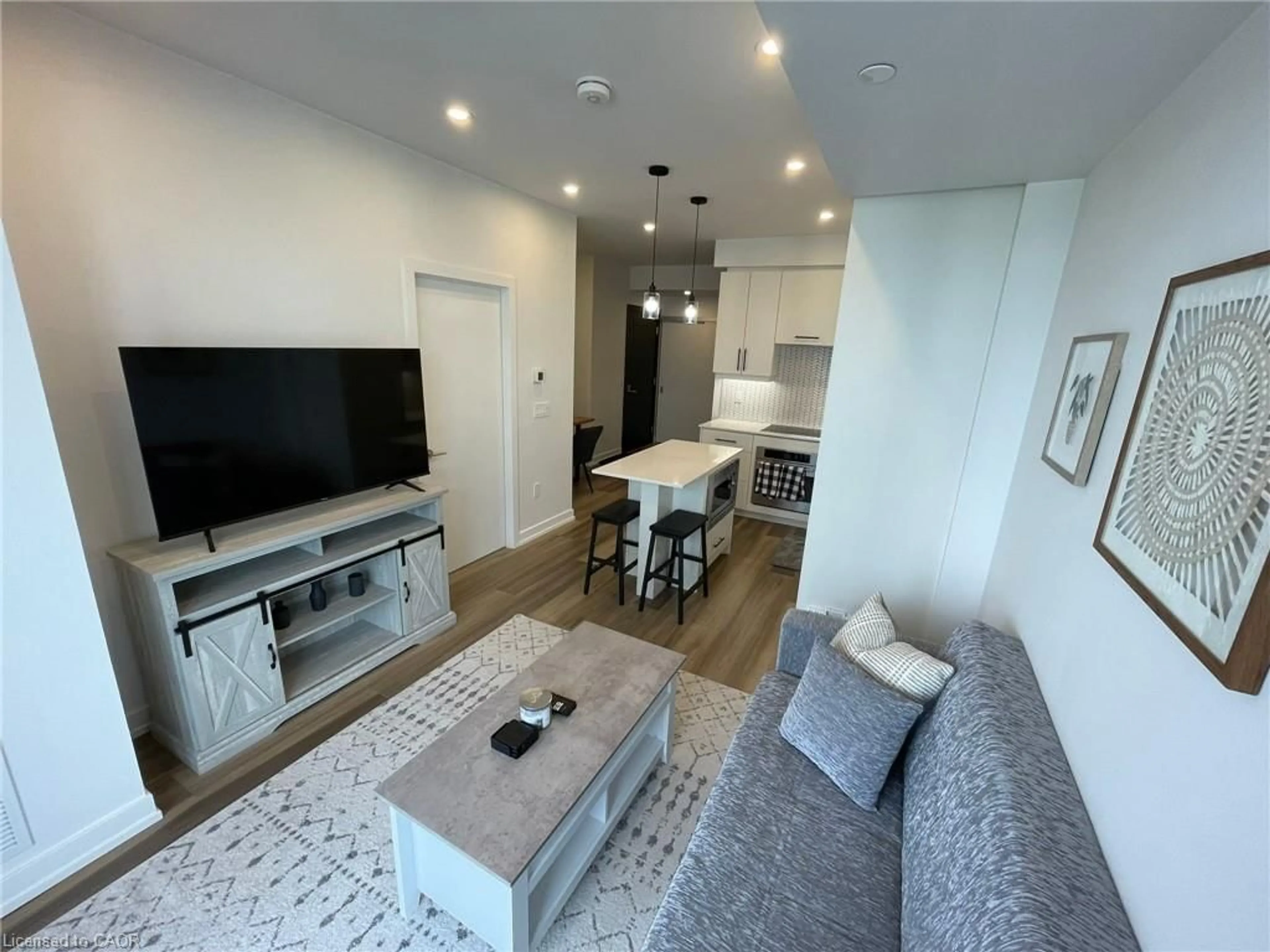 Living room with furniture, unknown for 15 Wellington St #1701, Kitchener Ontario N2G 0E4