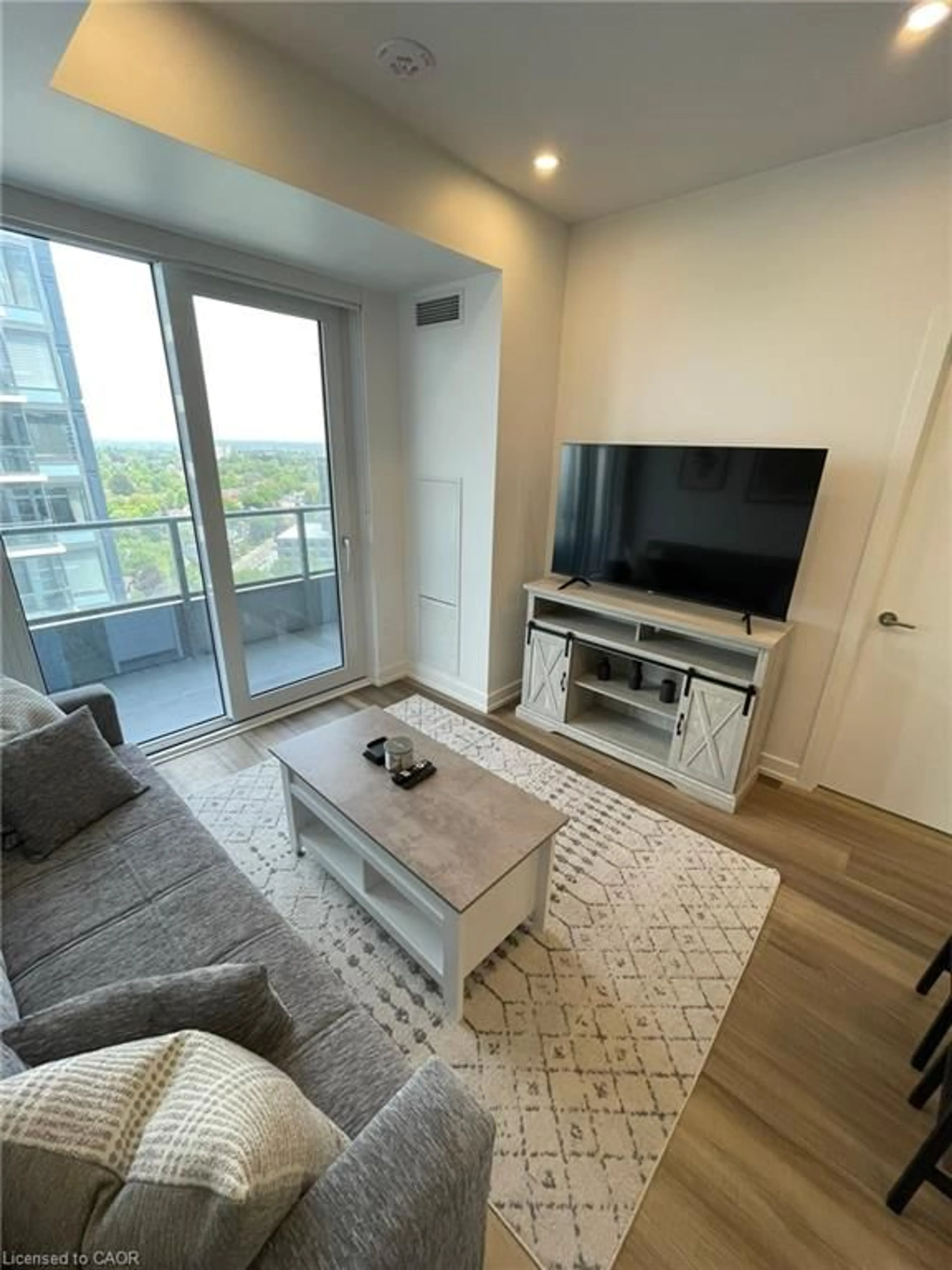 Living room with furniture, unknown for 15 Wellington St #1701, Kitchener Ontario N2G 0E4