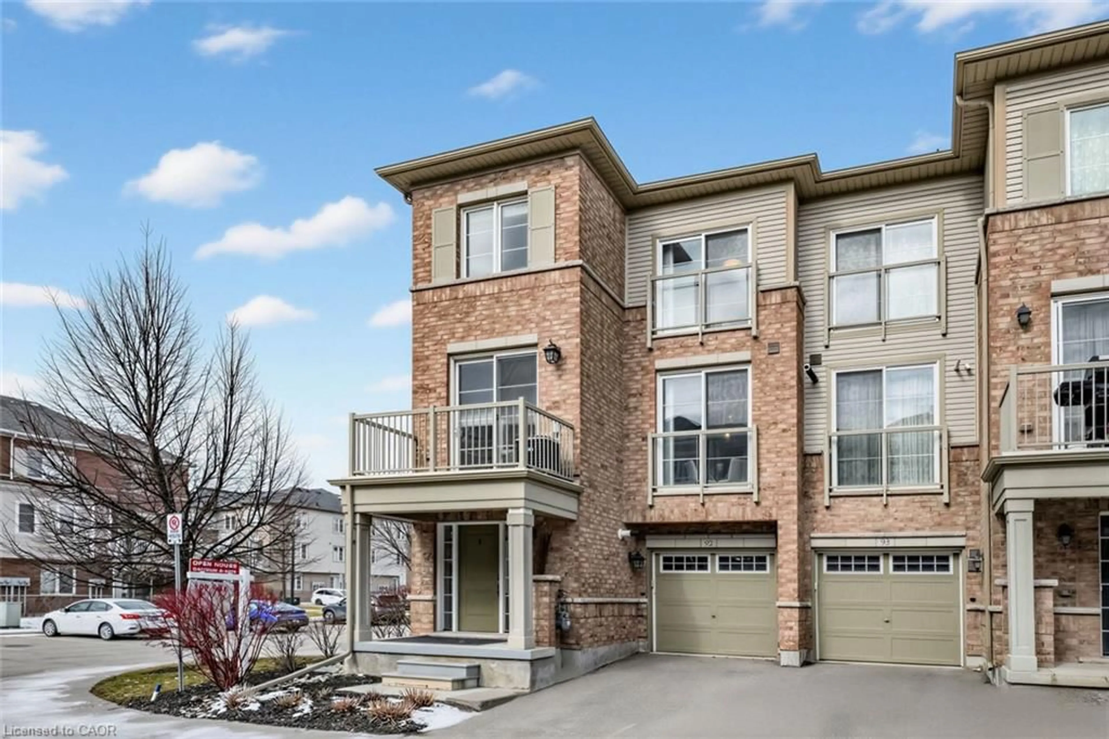 Home with brick exterior material, street for 165 Hampshire Way #92, Milton Ontario L9T 8M7