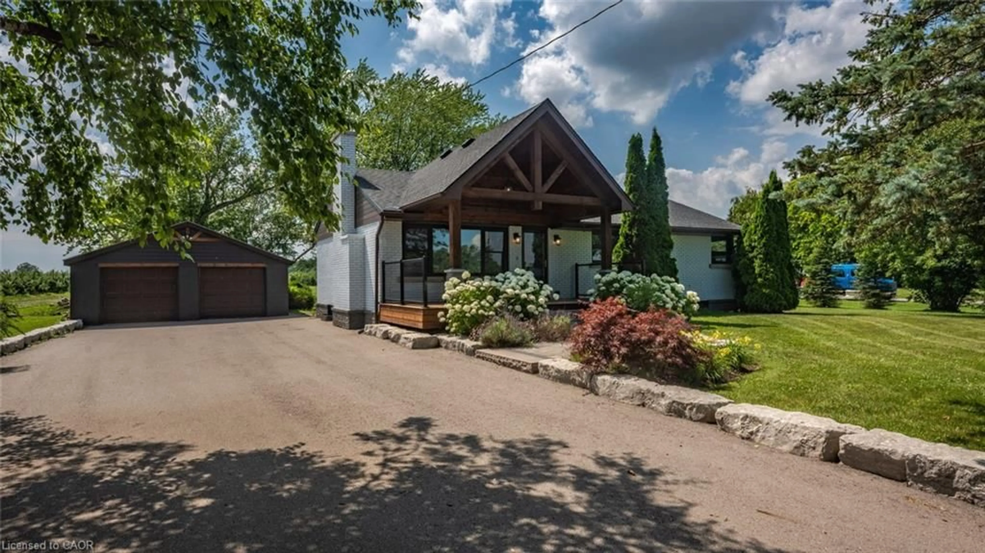 A pic from outside/outdoor area/front of a property/back of a property/a pic from drone, street for 905 Blueline Rd, Simcoe Ontario N3Y 4K4