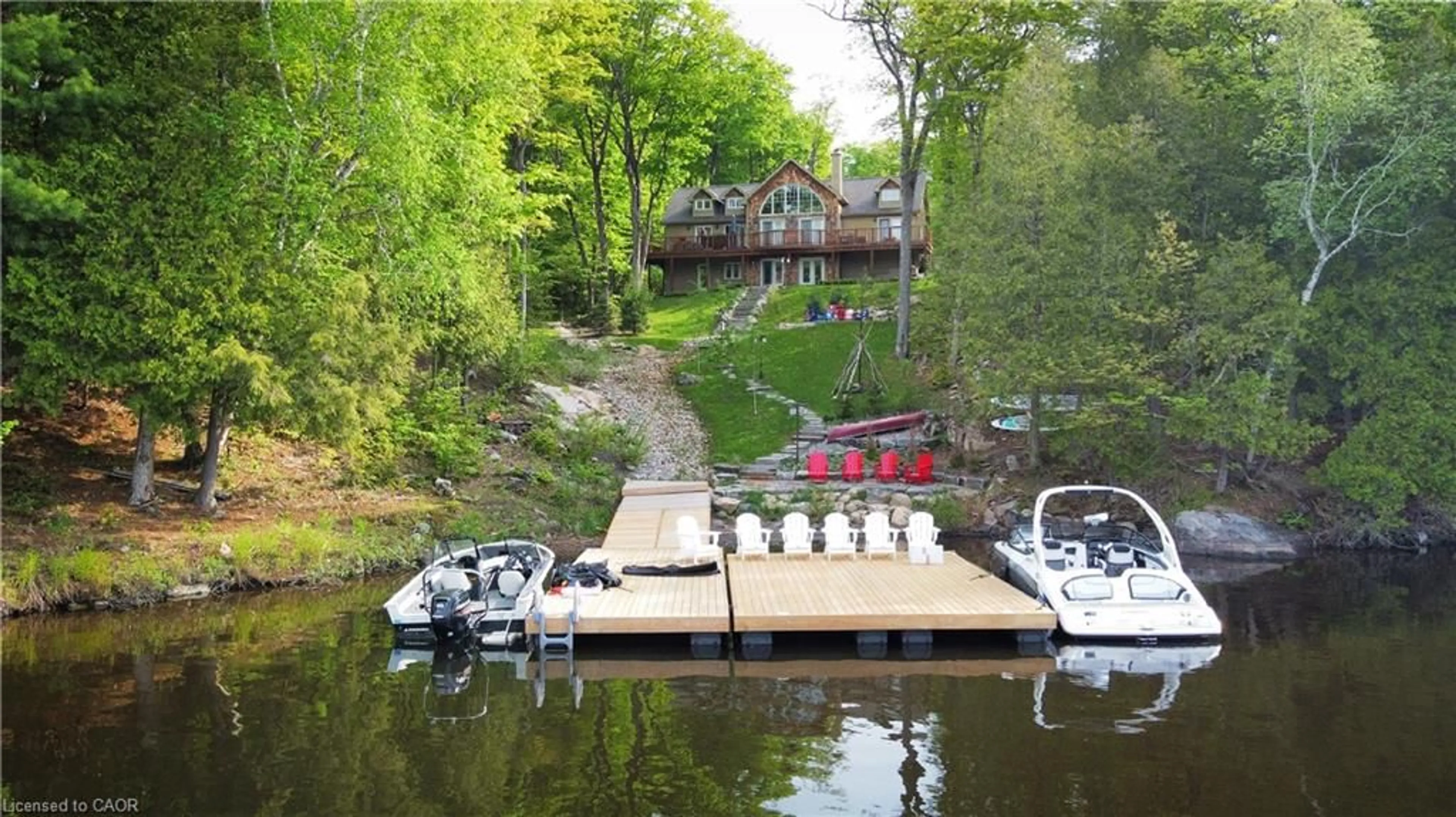A pic from outside/outdoor area/front of a property/back of a property/a pic from drone, water/lake/river/ocean view for 1235 Shea Rd, Utterson Ontario P0B 1M0