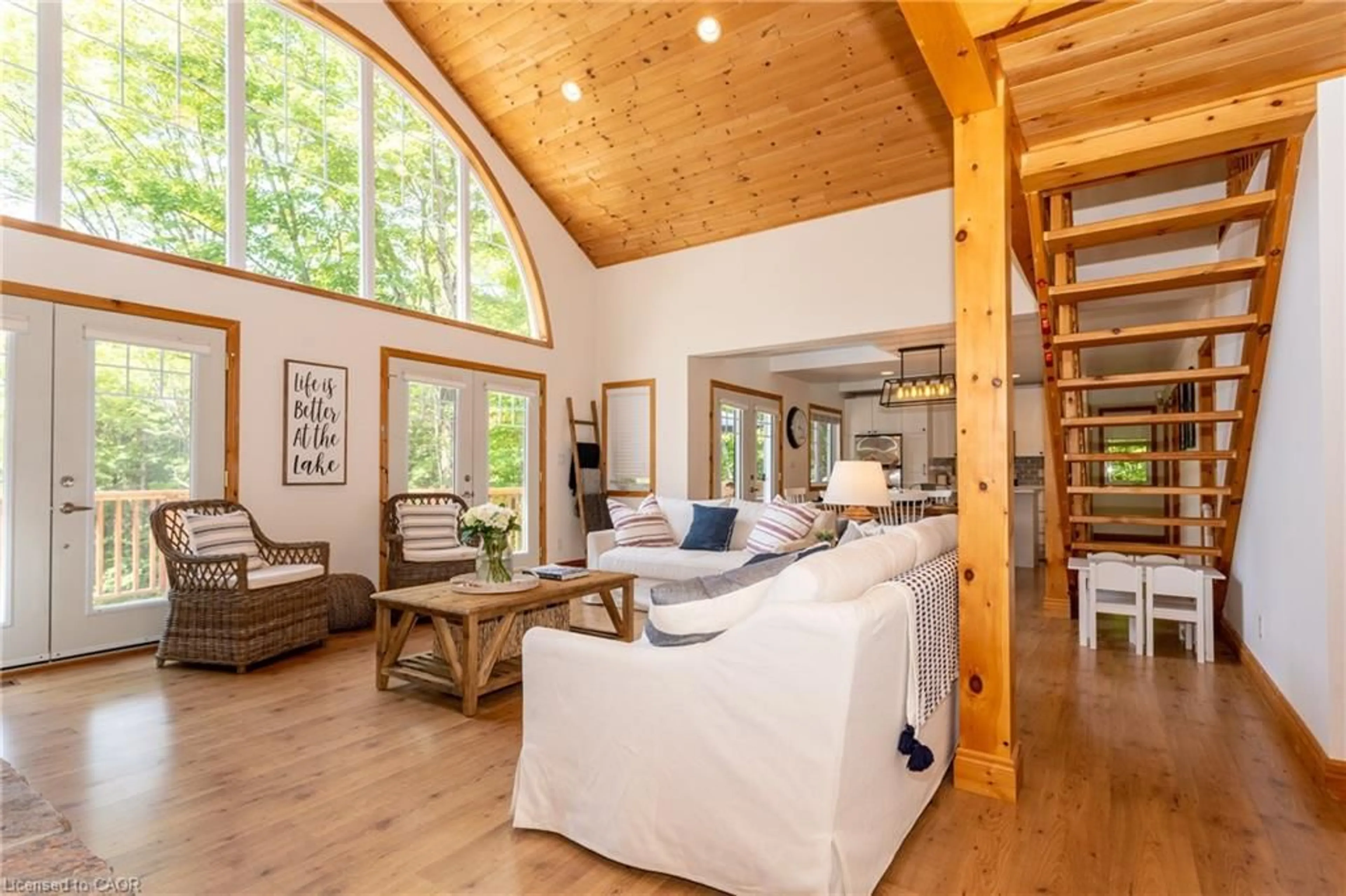 Living room with furniture, wood/laminate floor for 1235 Shea Rd, Utterson Ontario P0B 1M0