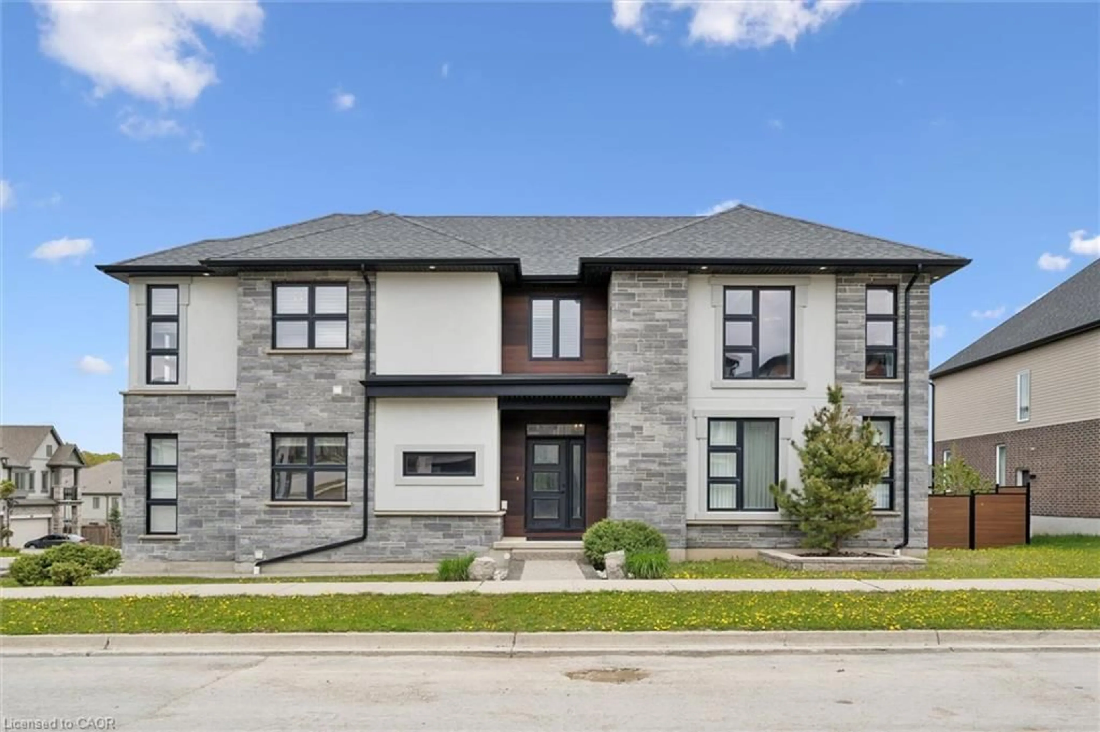 Home with brick exterior material, street for 573 Mayapple St, Waterloo Ontario N2V 0G2