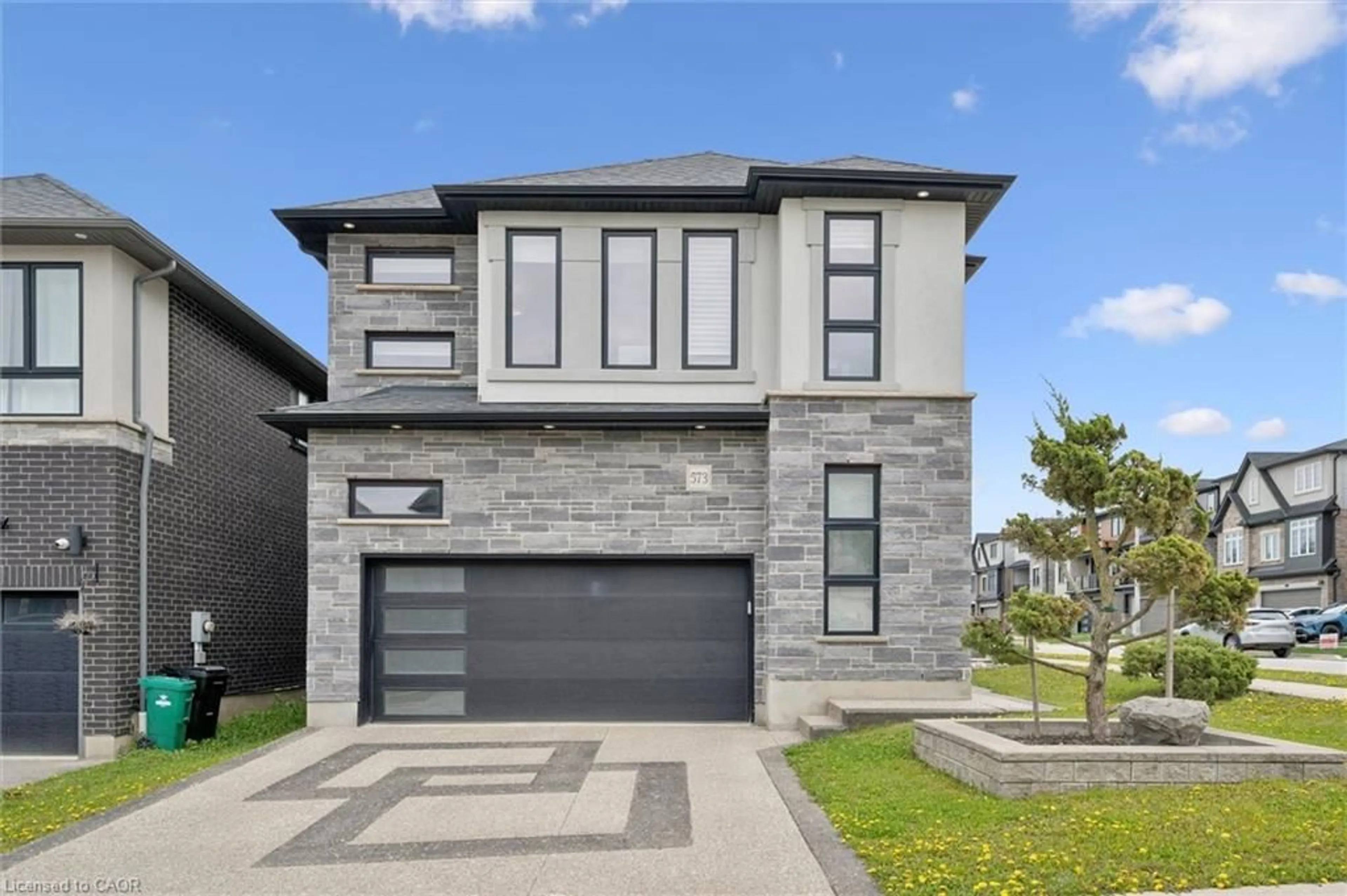 Home with brick exterior material, street for 573 Mayapple St, Waterloo Ontario N2V 0G2