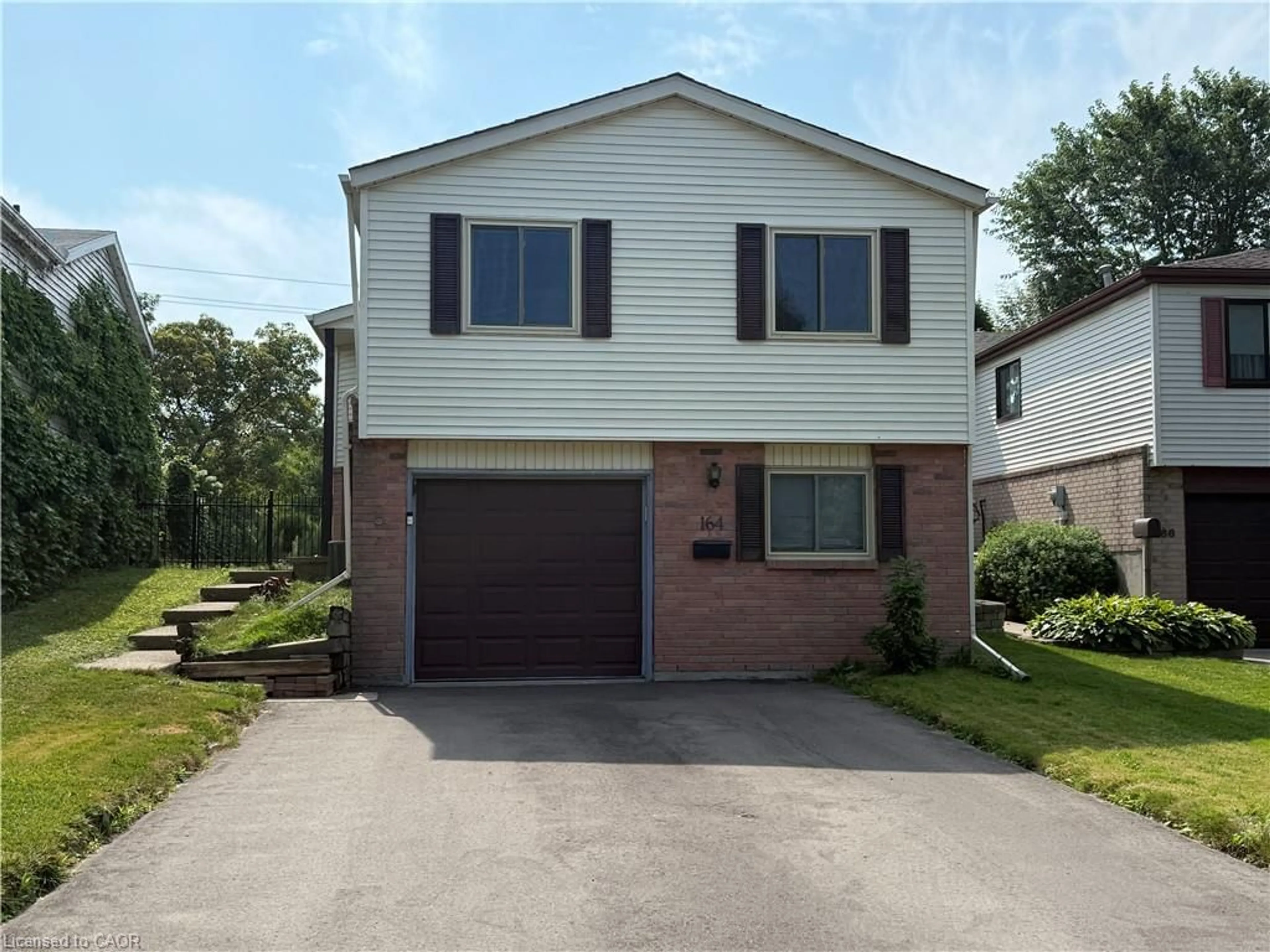 Home with vinyl exterior material, street for 164 Herron Pl, Waterloo Ontario N2T 1H2