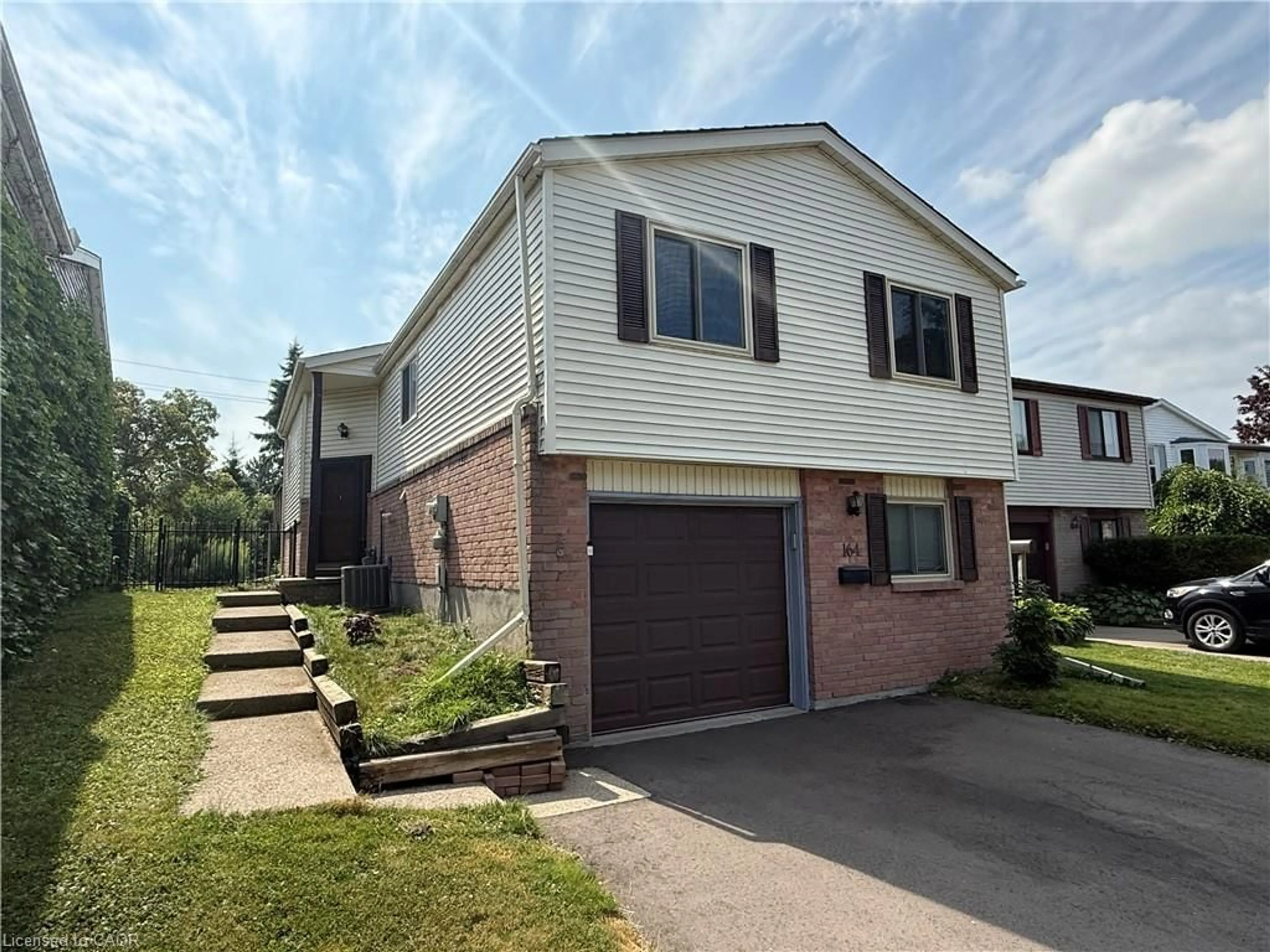 Home with brick exterior material, street for 164 Herron Pl, Waterloo Ontario N2T 1H2
