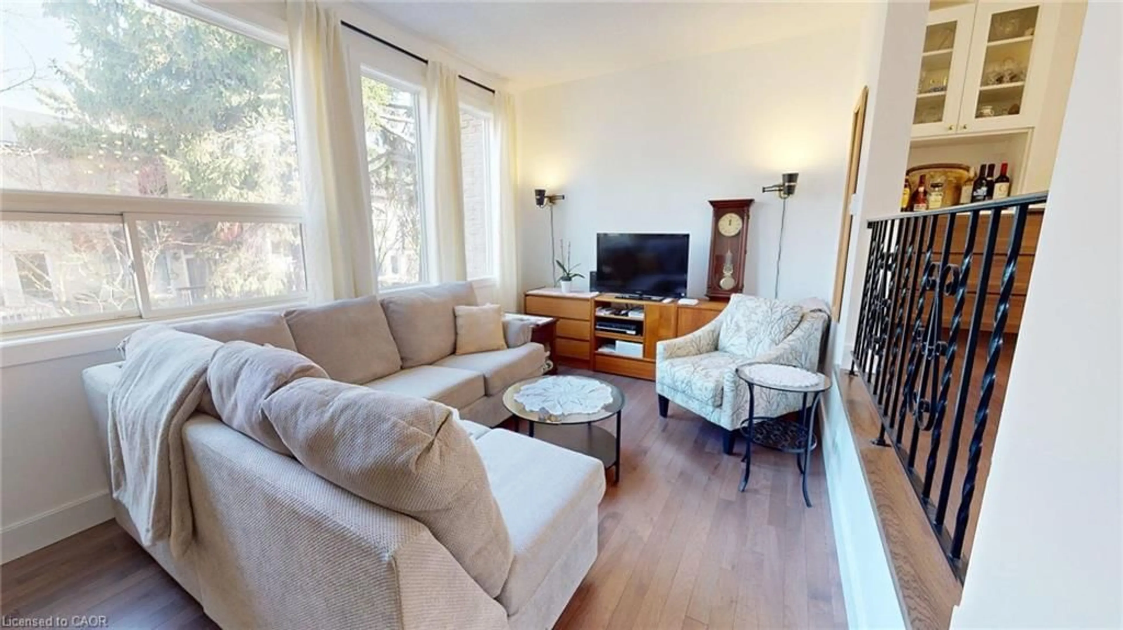 Living room with furniture, wood/laminate floor for 1967 Main St #35, Hamilton Ontario L8S 4P4