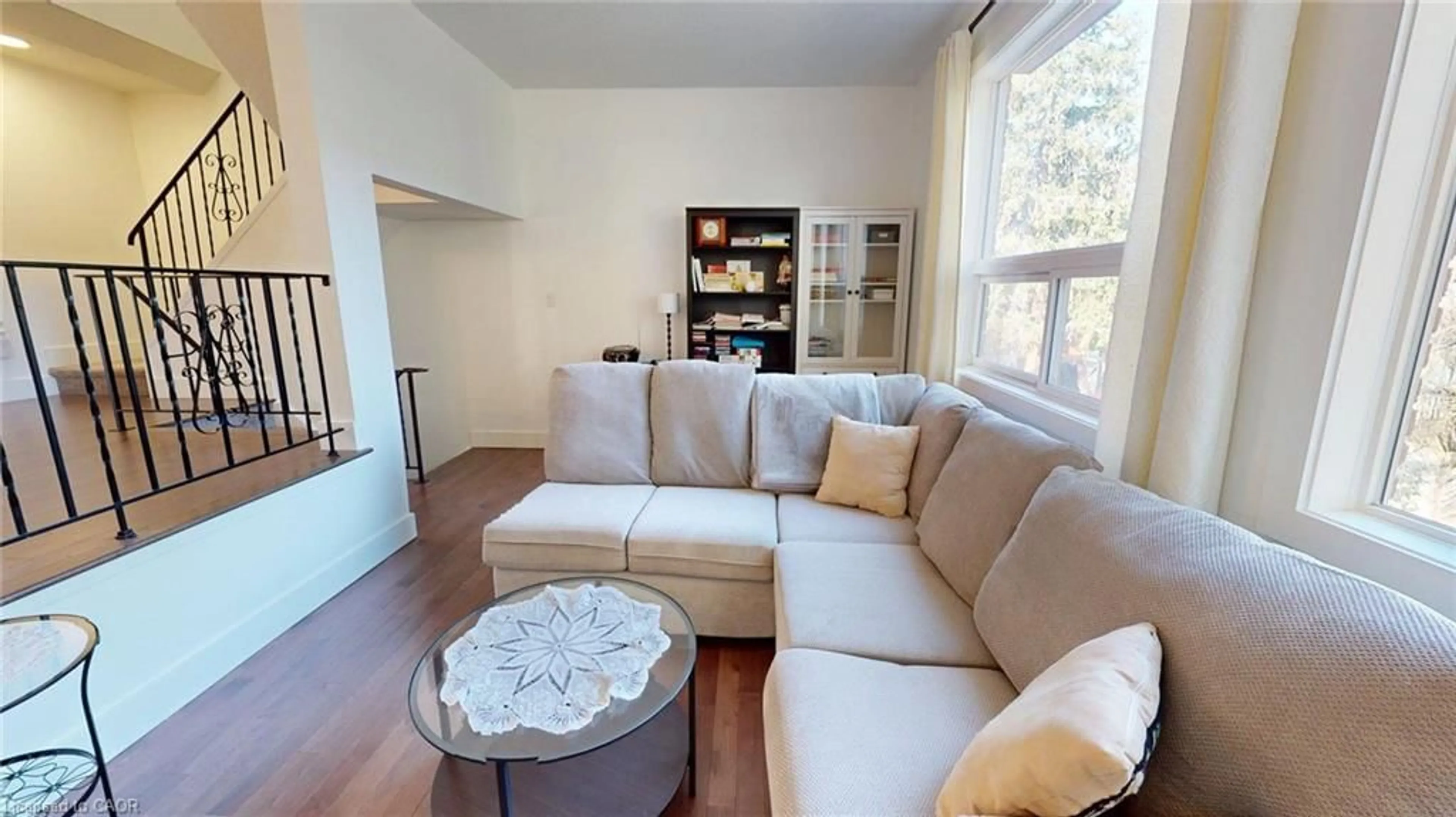 Living room with furniture, wood/laminate floor for 1967 Main St #35, Hamilton Ontario L8S 4P4