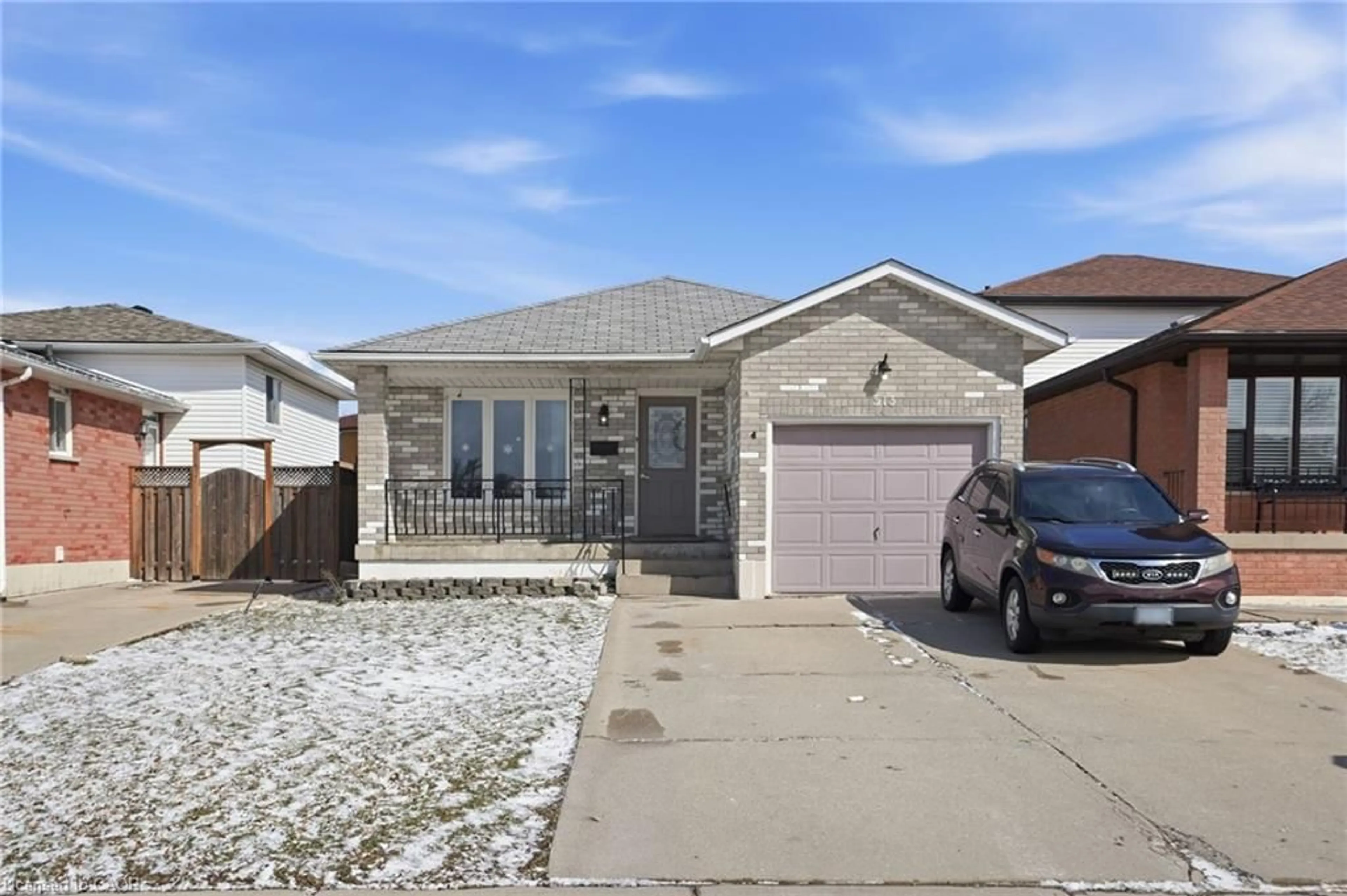 Home with brick exterior material, street for 513 Rexford Dr, Hamilton Ontario L8W 3C1