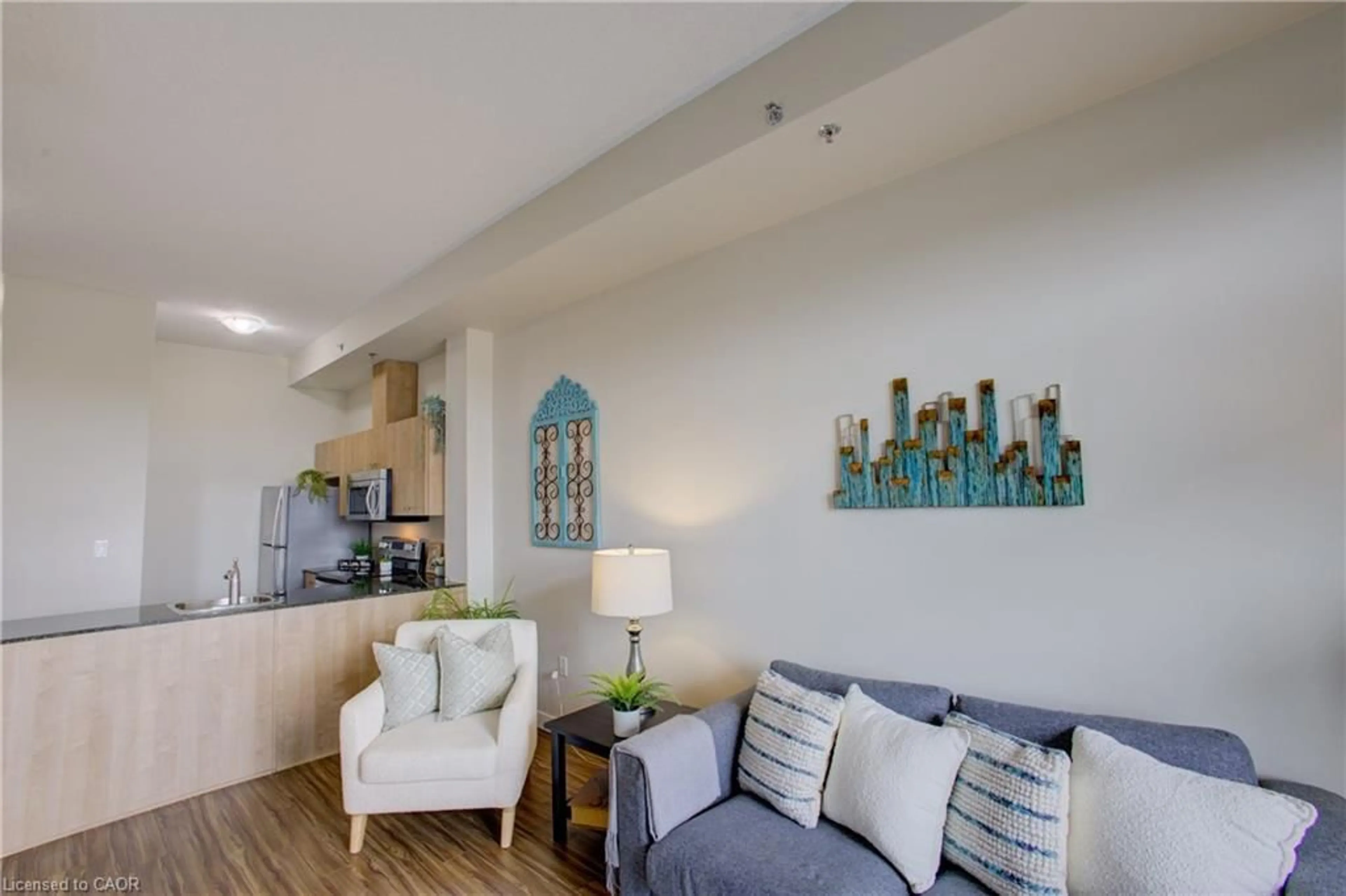 Living room with furniture, unknown for 150 Water St #104, Cambridge Ontario N1R 0B5