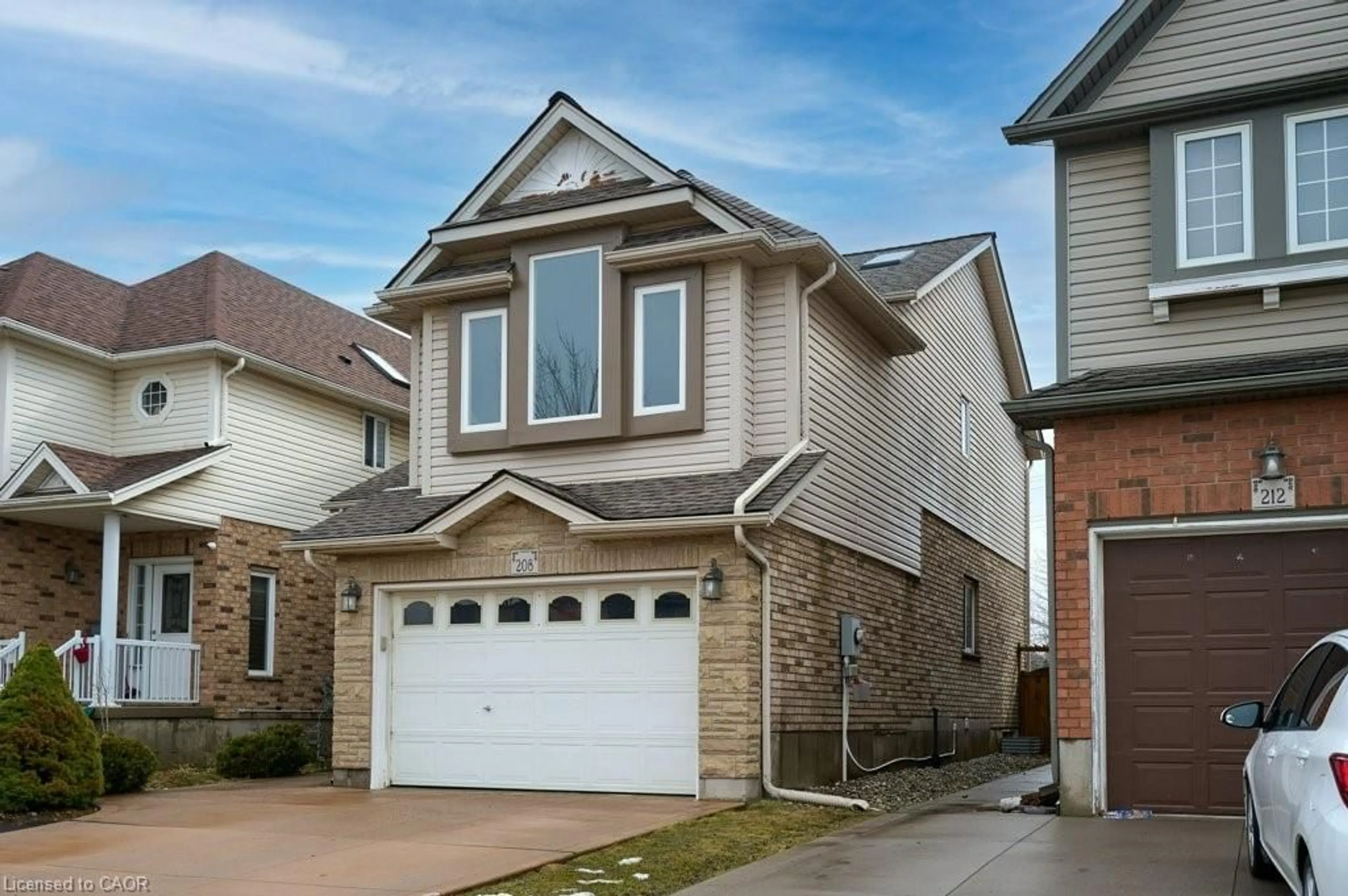 Home with vinyl exterior material, street for 208 Sienna Cres, Kitchener Ontario N2R 1T4