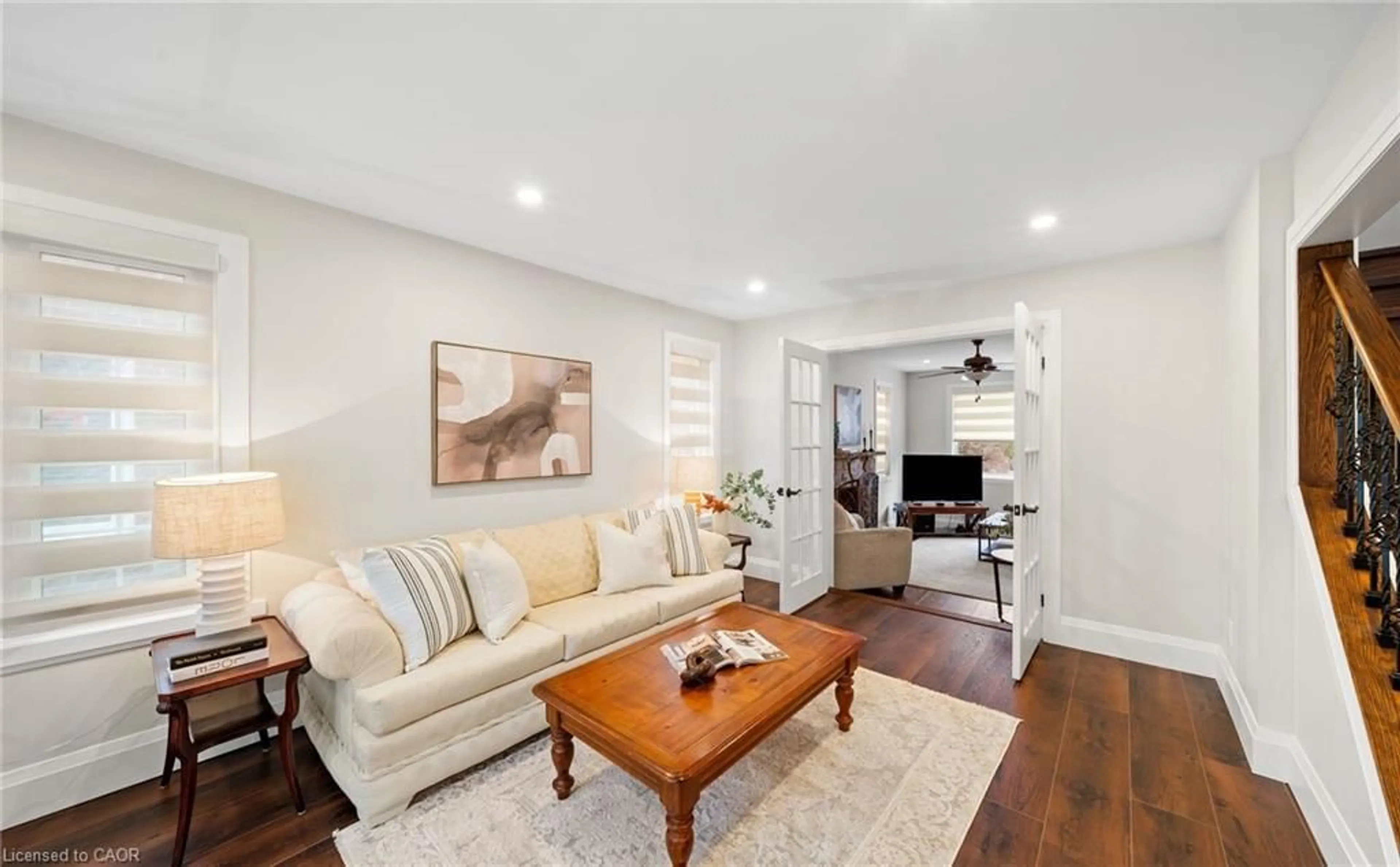 Living room with furniture, wood/laminate floor for 4516 Gullfoot Cir, Mississauga Ontario L4Z 2J2