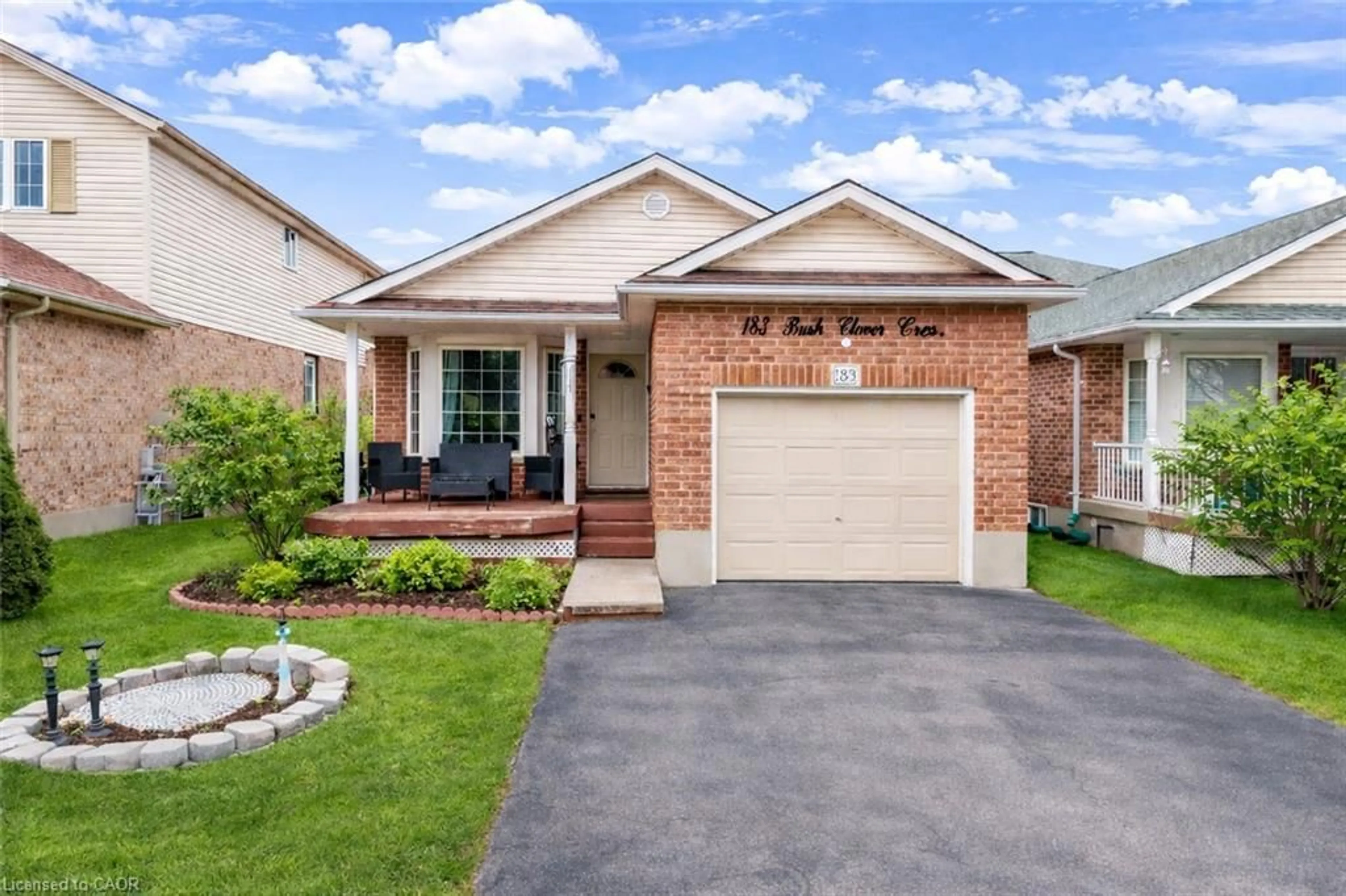 Home with brick exterior material, street for 183 Bush Clover Cres, Kitchener Ontario N2E 3P7