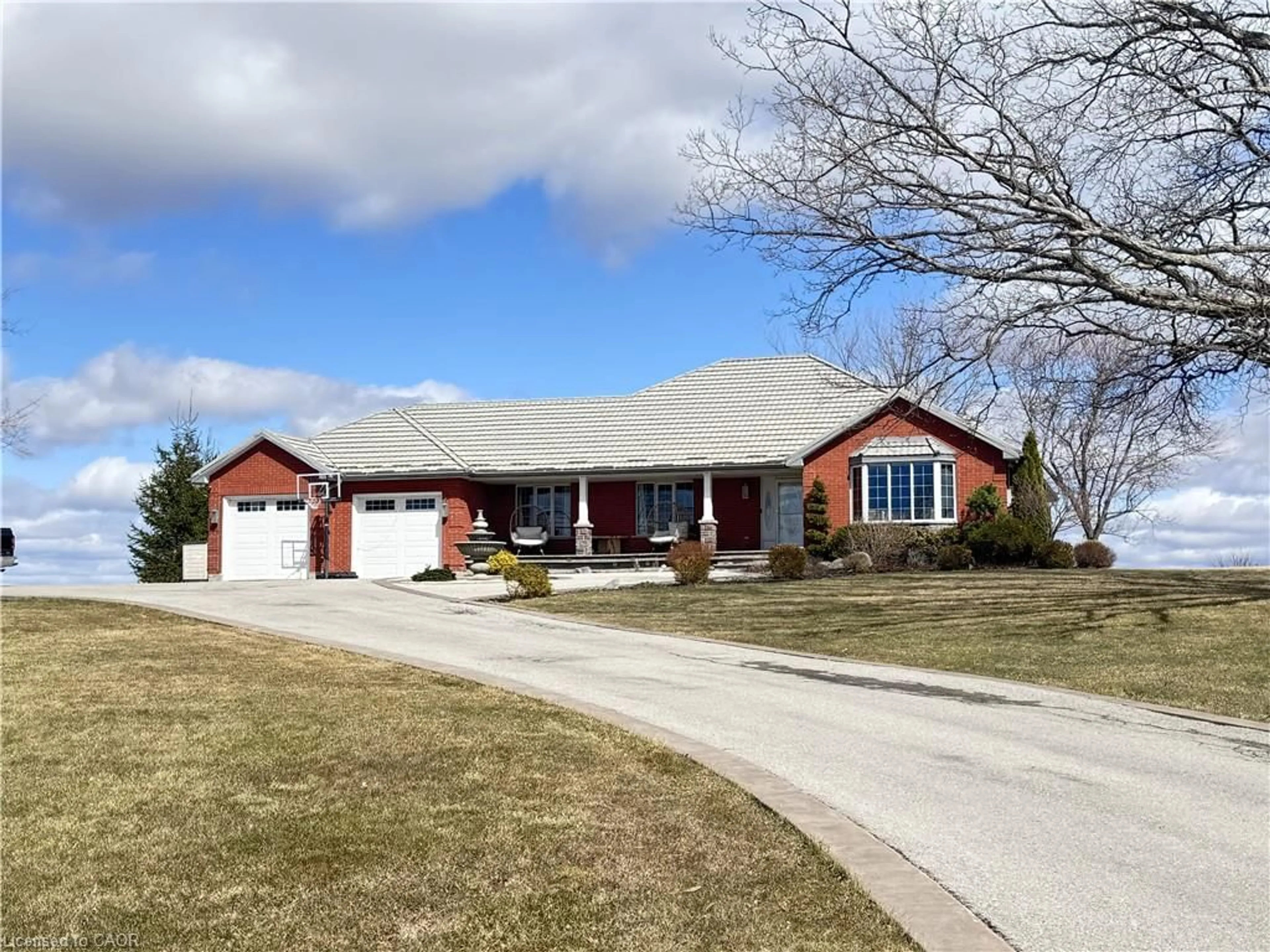 Home with brick exterior material, street for 3810 River Rd, Caledonia Ontario N3W 2K7