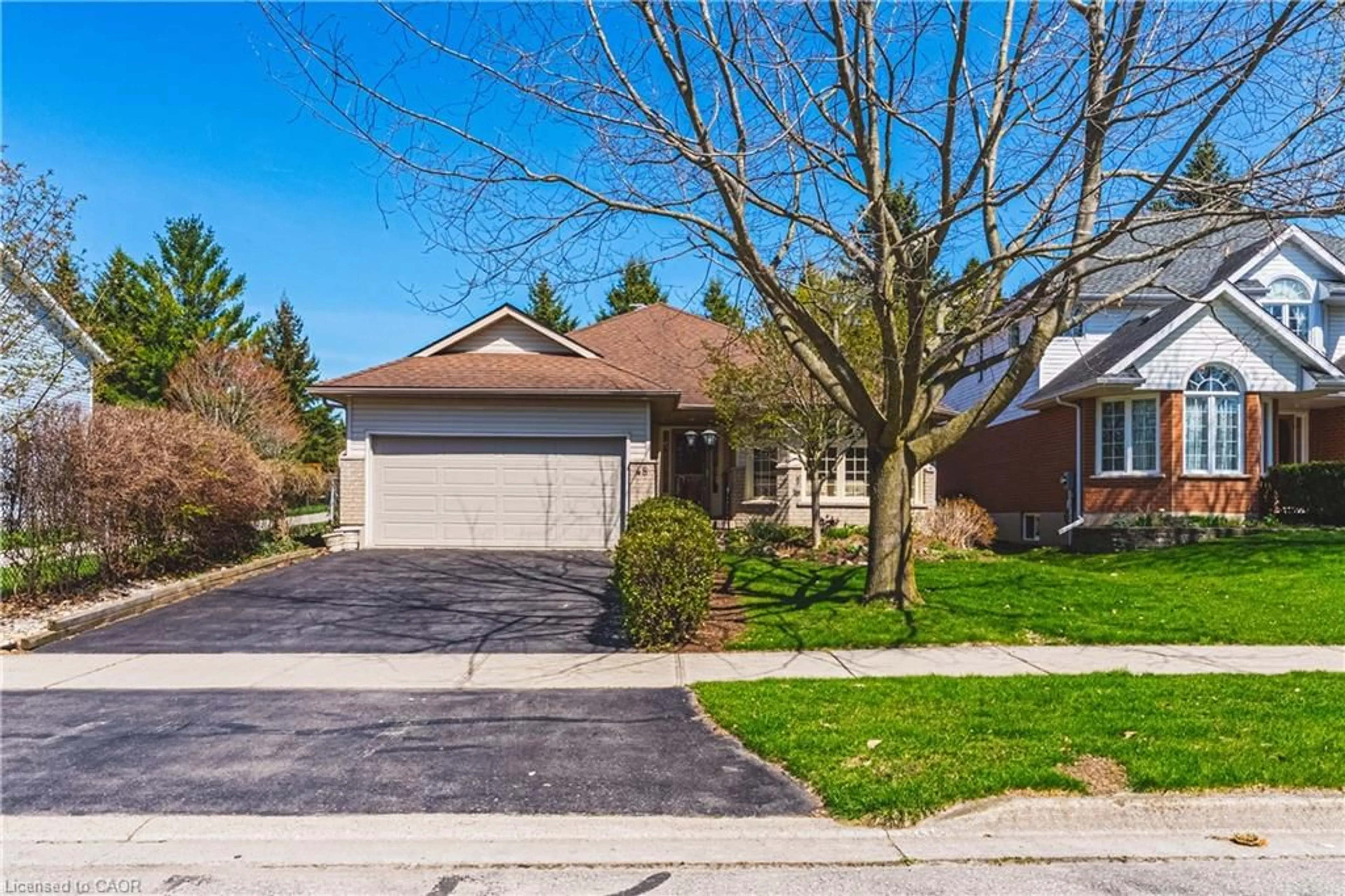 Home with brick exterior material, street for 48 Tanager Dr, Guelph Ontario N1C 1B6