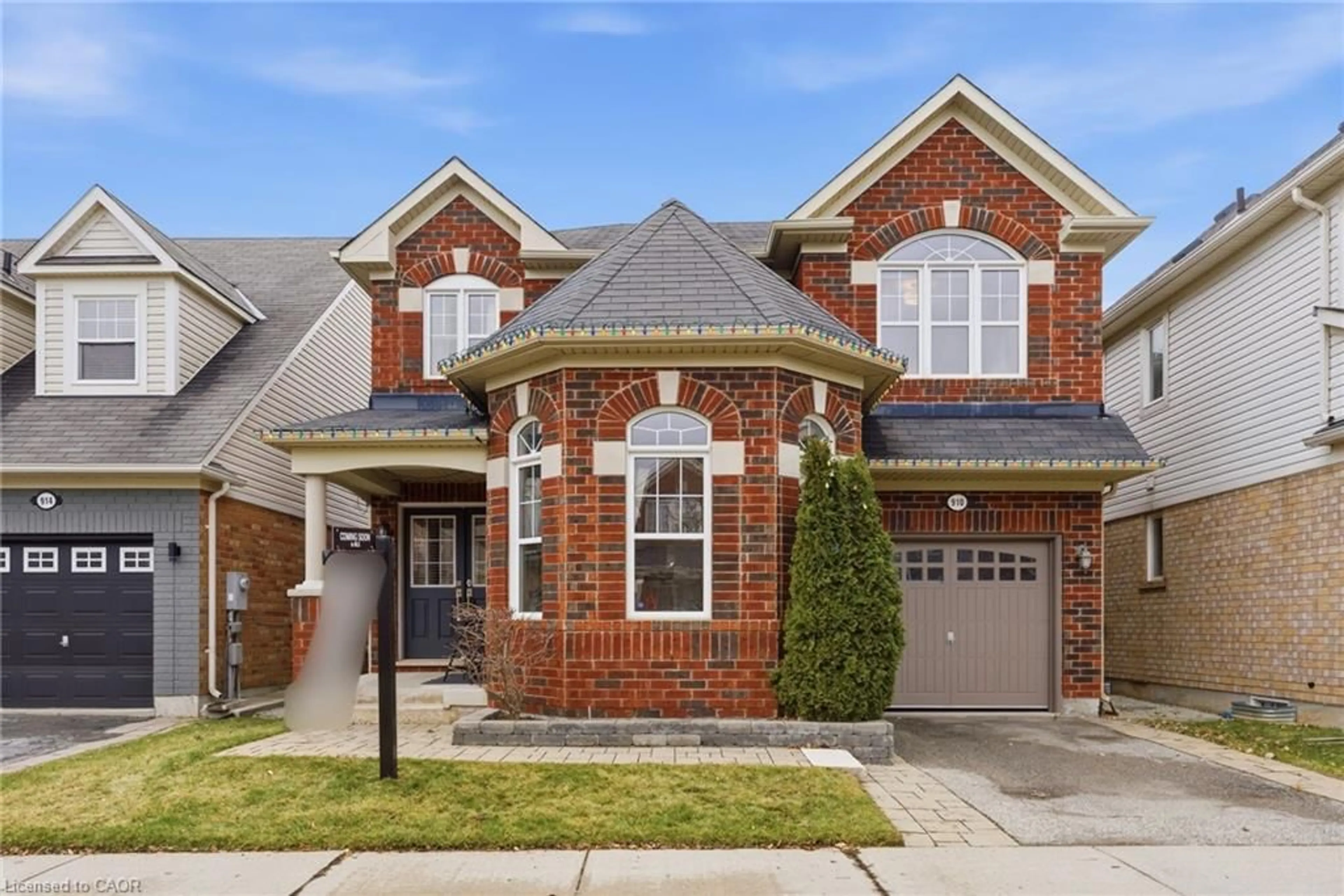 Home with brick exterior material, street for 910 Vickerman Way, Milton Ontario L9T 0K5