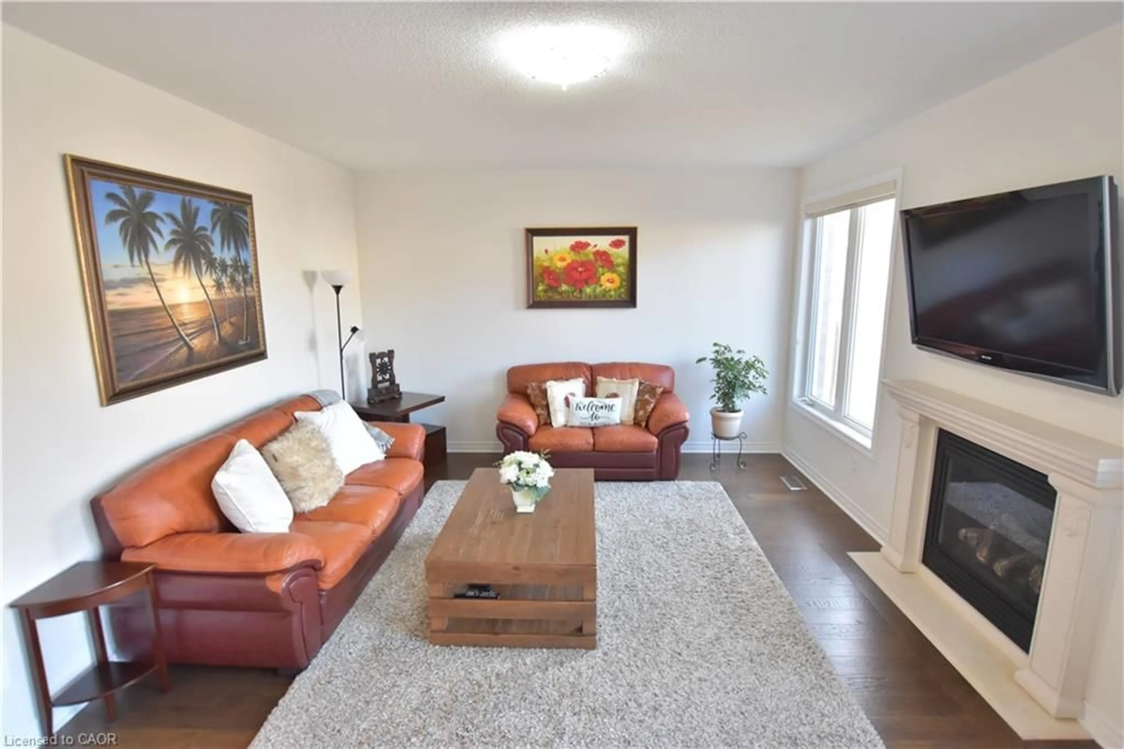 Living room with furniture, wood/laminate floor for 512 Terrington Cres, Kitchener Ontario N2P 0B9