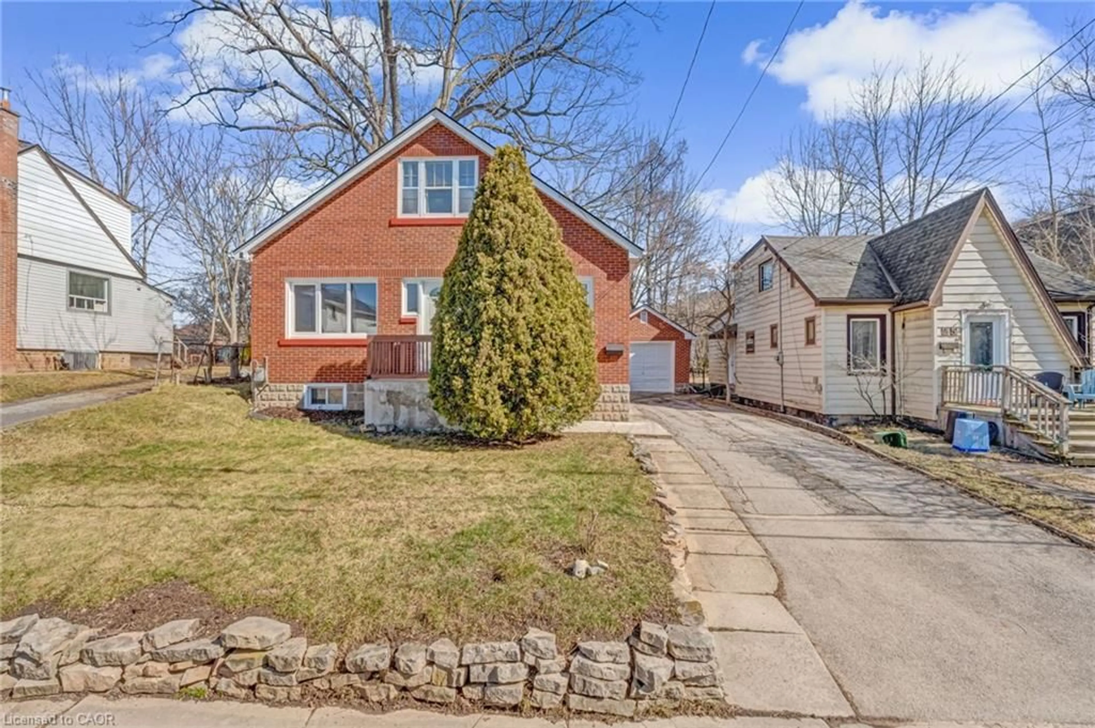 Home with brick exterior material, street for 23 Clifford St, Hamilton Ontario L8S 2Z7