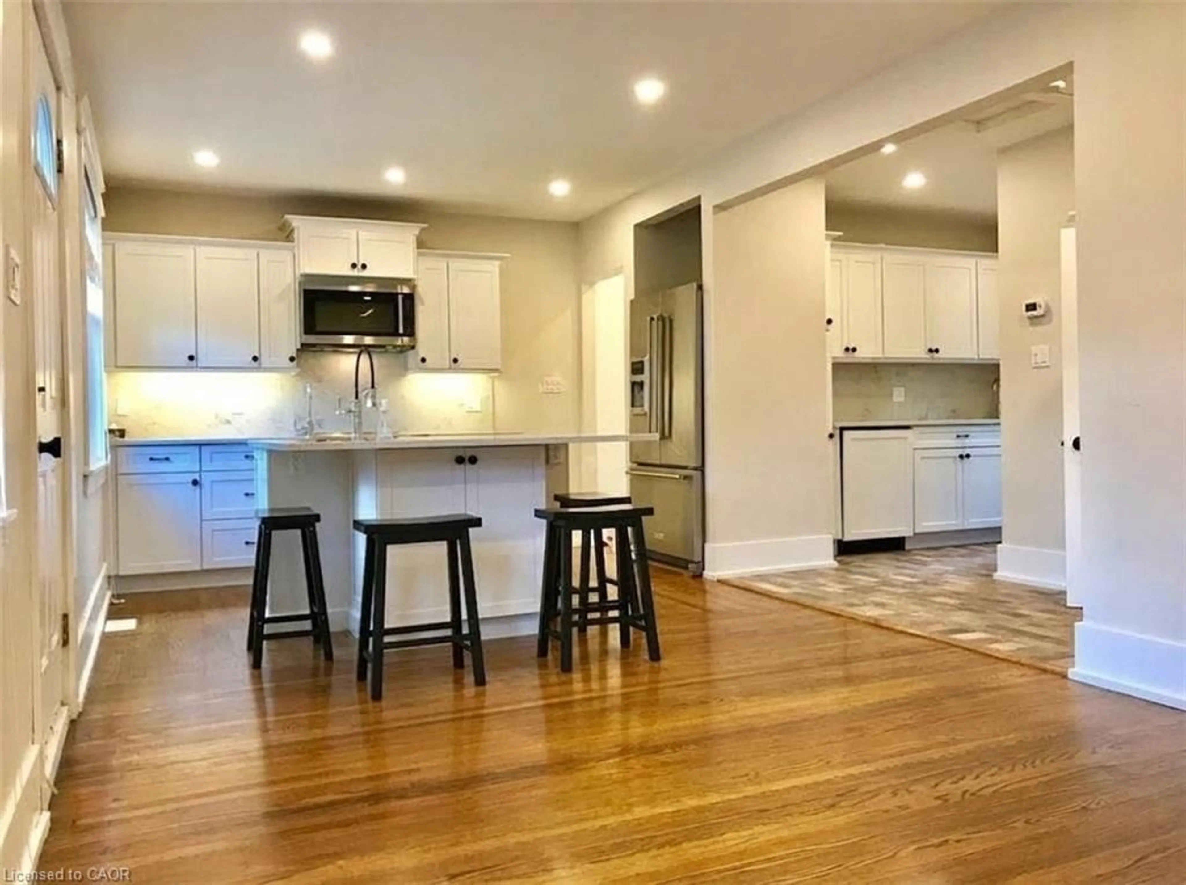 Open concept kitchen, wood/laminate floor for 601 York St, Kitchener Ontario N2G 1T9