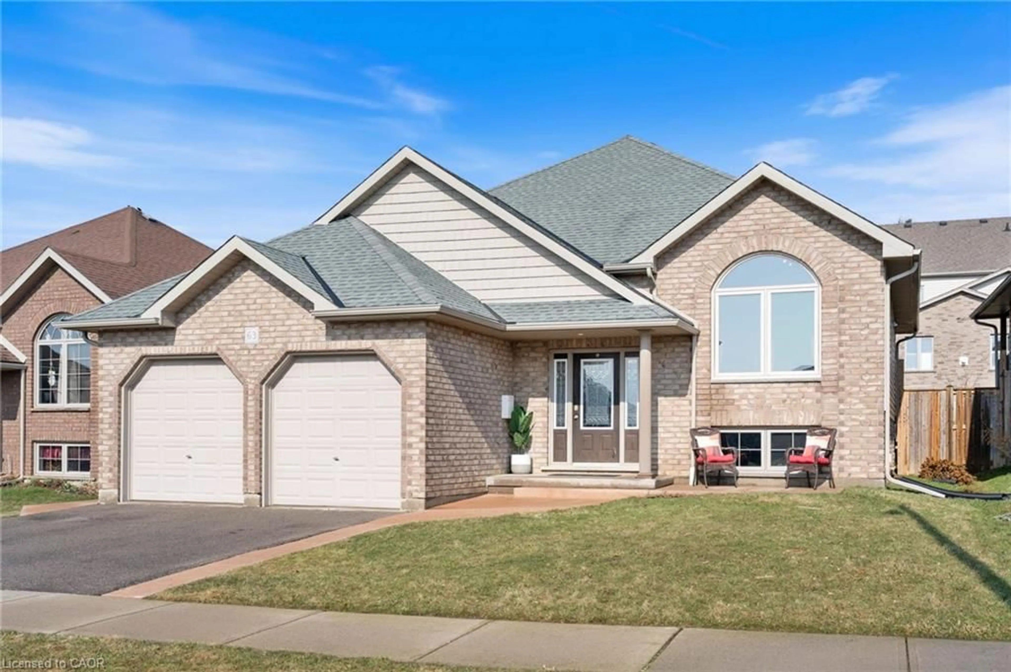 Home with brick exterior material, street for 63 Redbud Cres, Simcoe Ontario N3Y 0B8