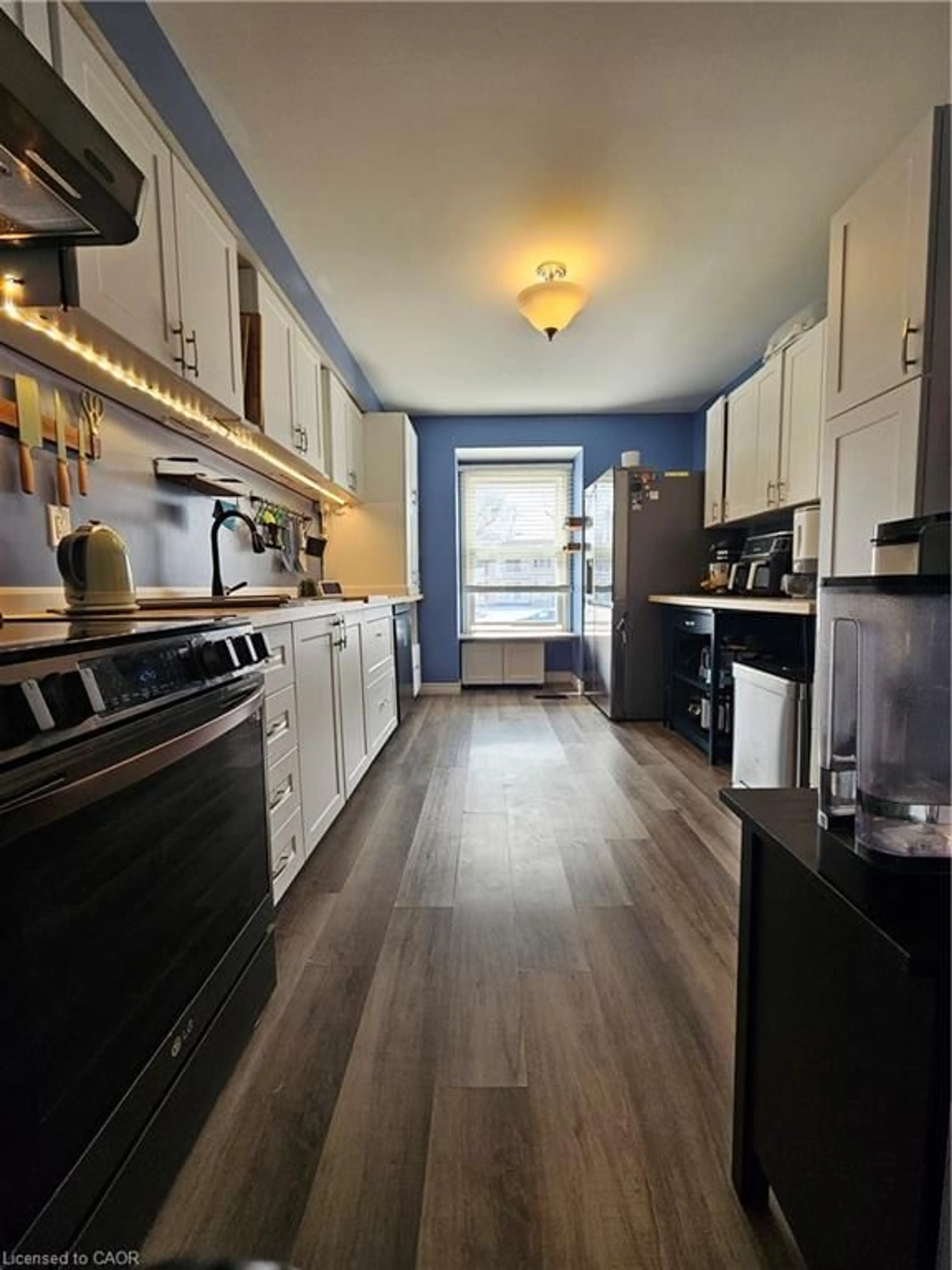 Kitchen with laundary machines, unknown for 662 Grey St #C, Brantford Ontario N3S 4V4