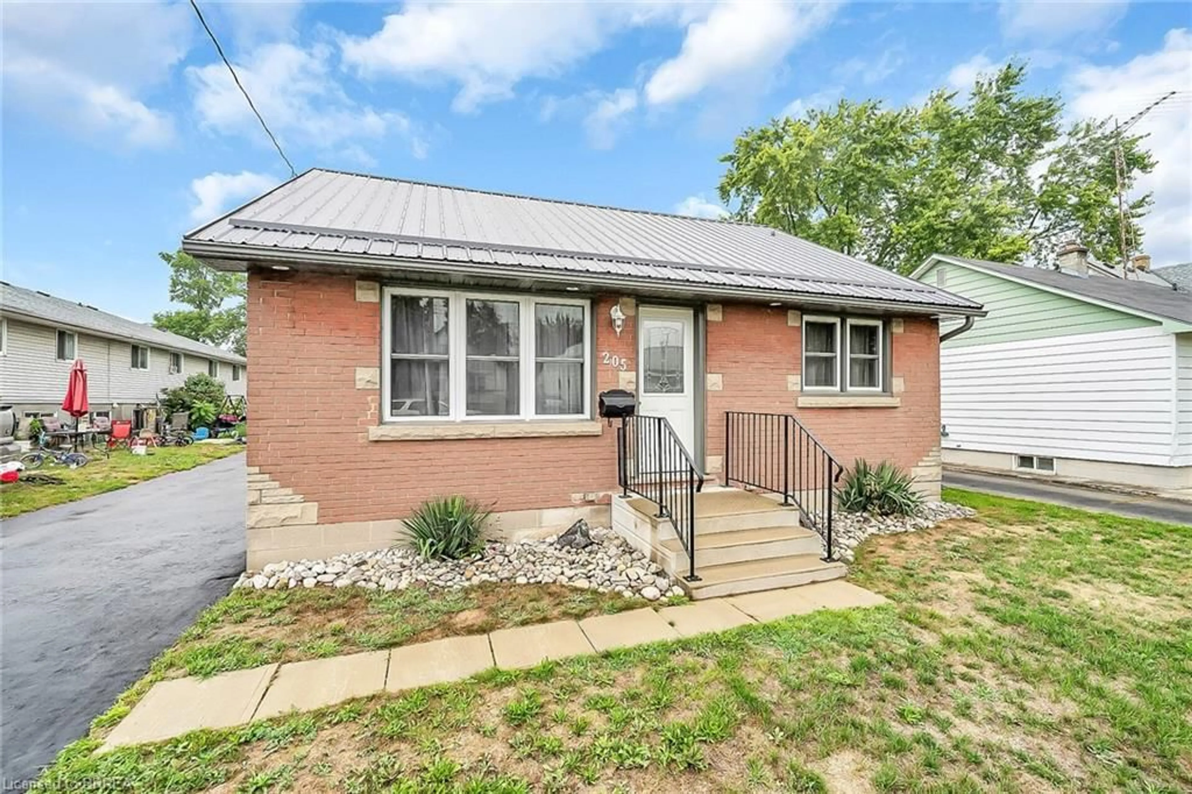 Home with brick exterior material, street for 205 Crysler St, Delhi Ontario N4B 1H9